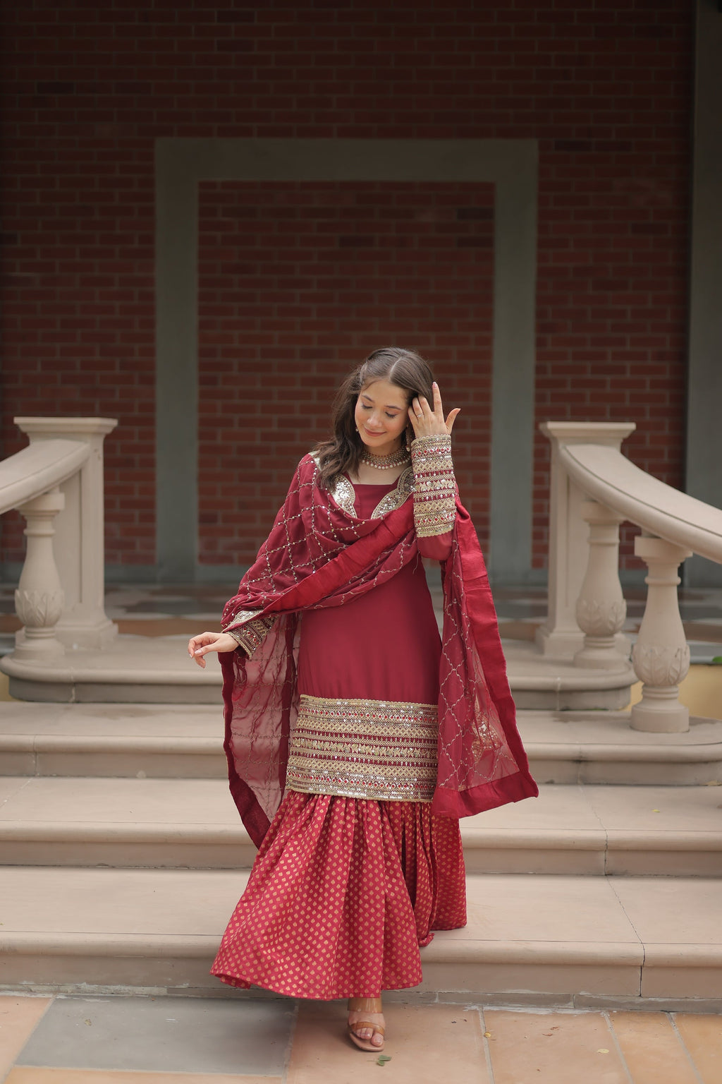 Maroon georgette embroidered Tishya designer sharara suit