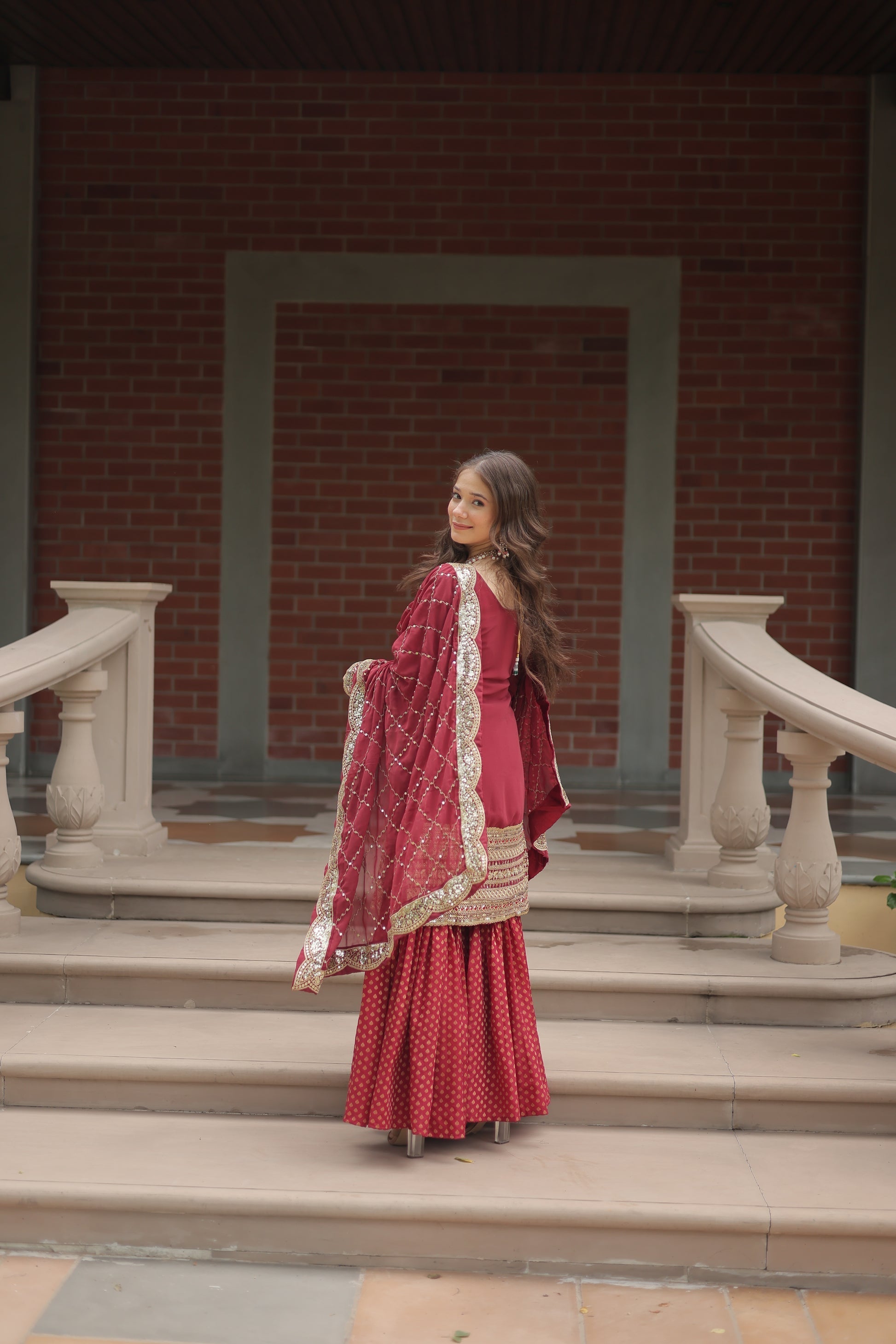 Maroon georgette embroidered Tishya designer sharara suit