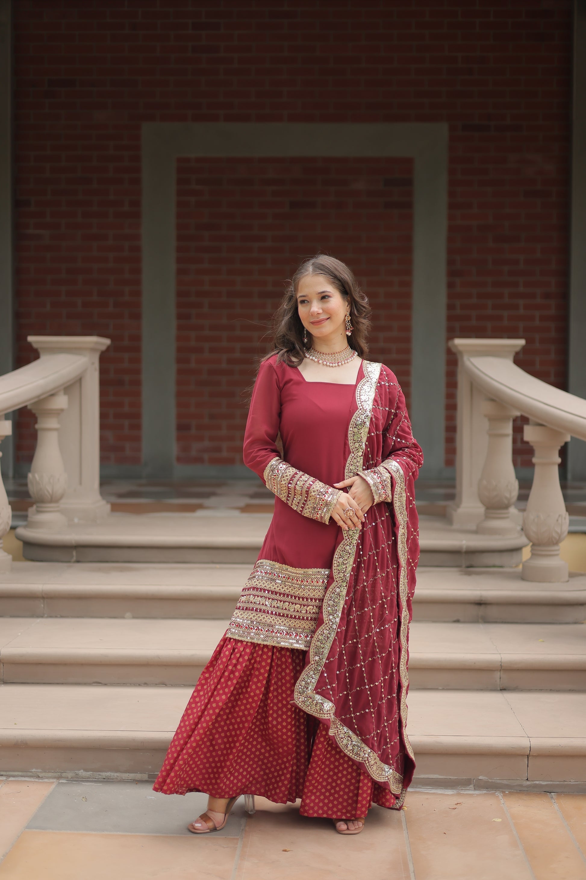 Maroon georgette embroidered Tishya designer sharara suit