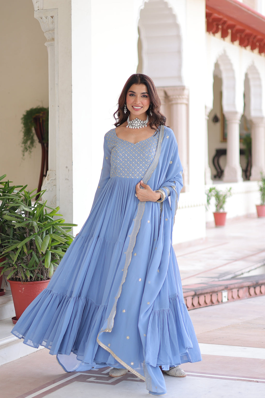 Mita sky blue faux georgette sequins zari embroidered gown with dupatta