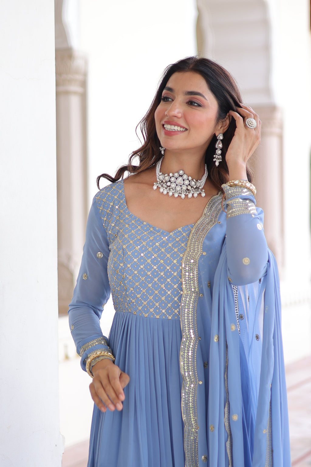 Mita sky blue faux georgette sequins zari embroidered gown with dupatta