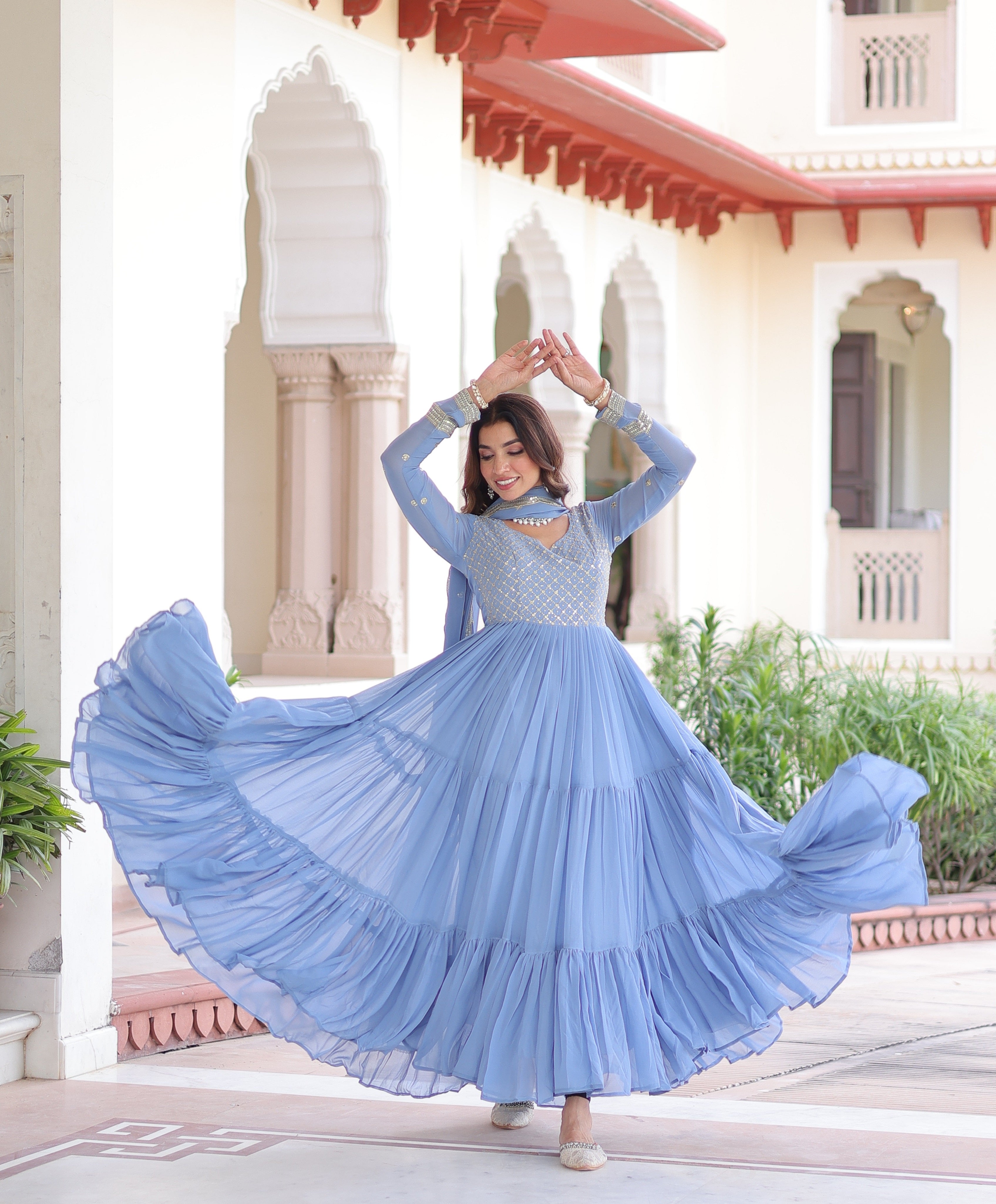 Mita sky blue faux georgette sequins zari embroidered gown with dupatta