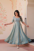 Vaibhavi Sky Blue Gown in Fendy Silk with beads embroidery, 3.5m flair & boat neck – fully stitched elegance for festive occasions.