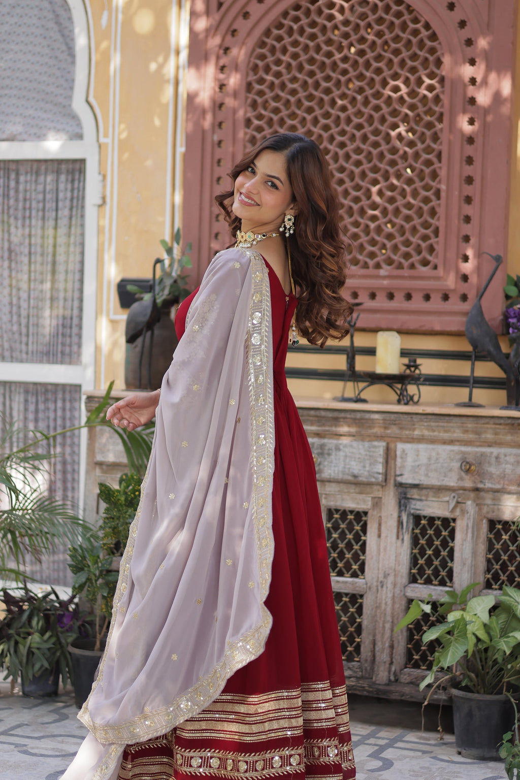 Varshini red embroidered anarkali gown set