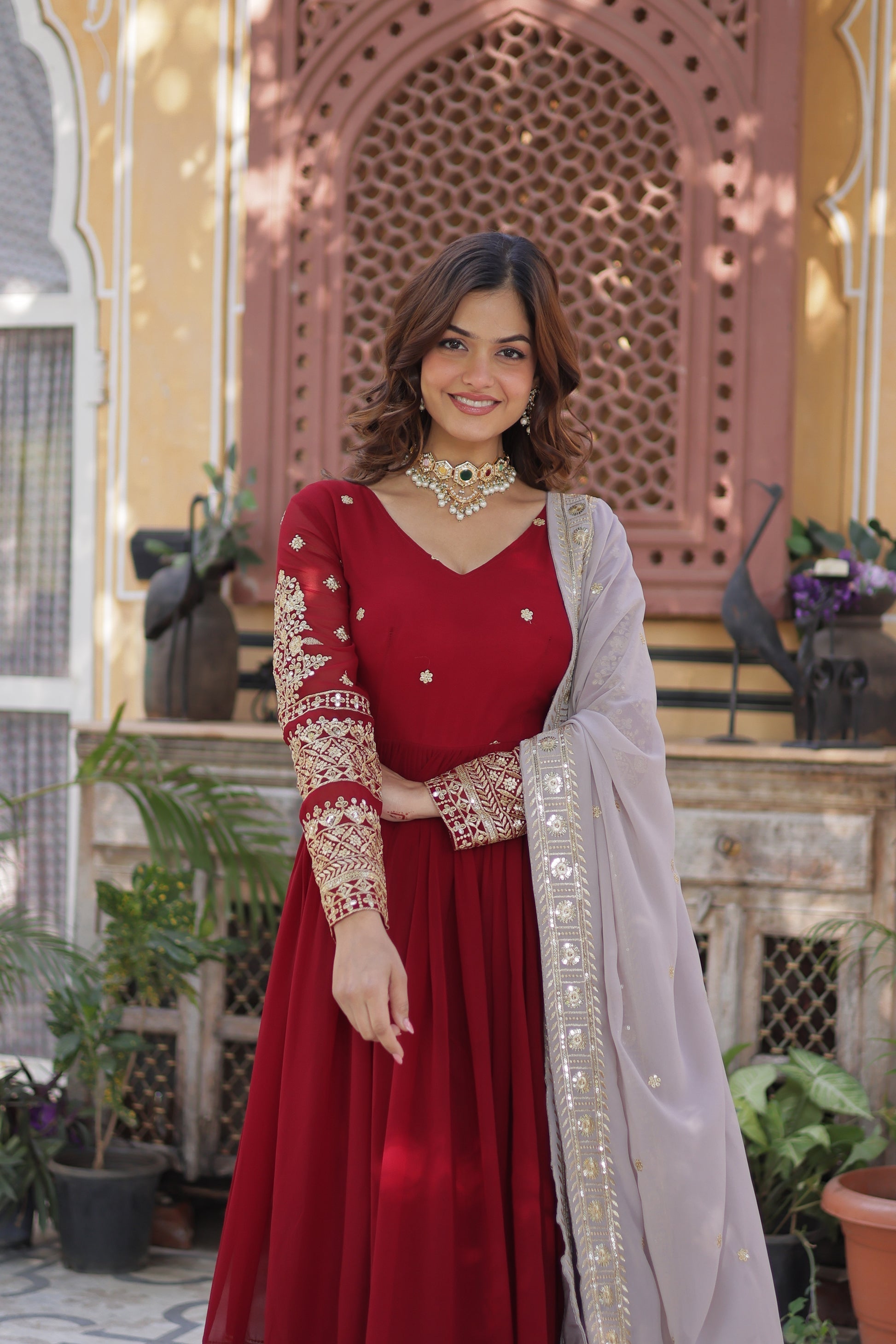 Varshini red embroidered anarkali gown set