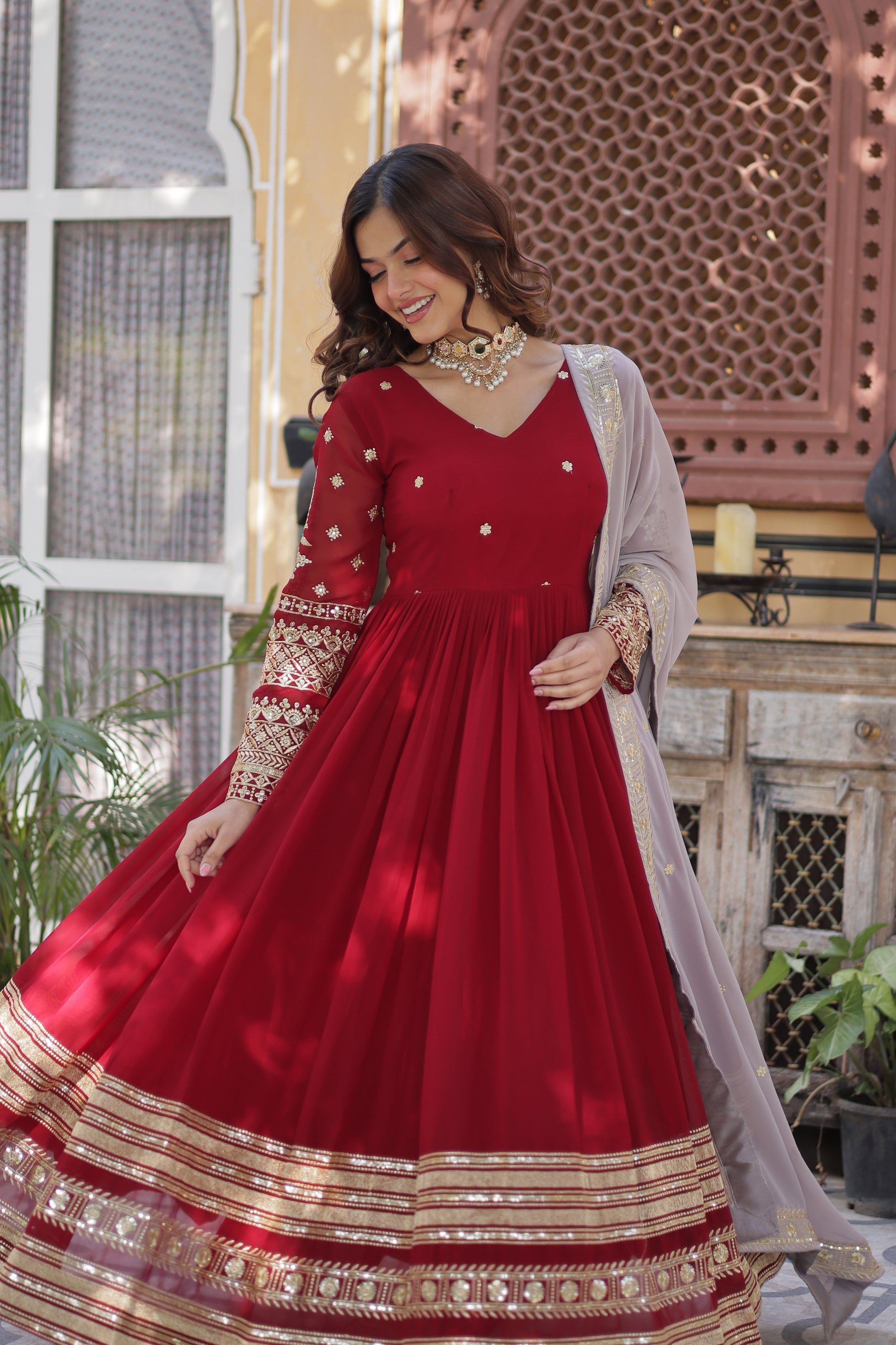Varshini red embroidered anarkali gown set
