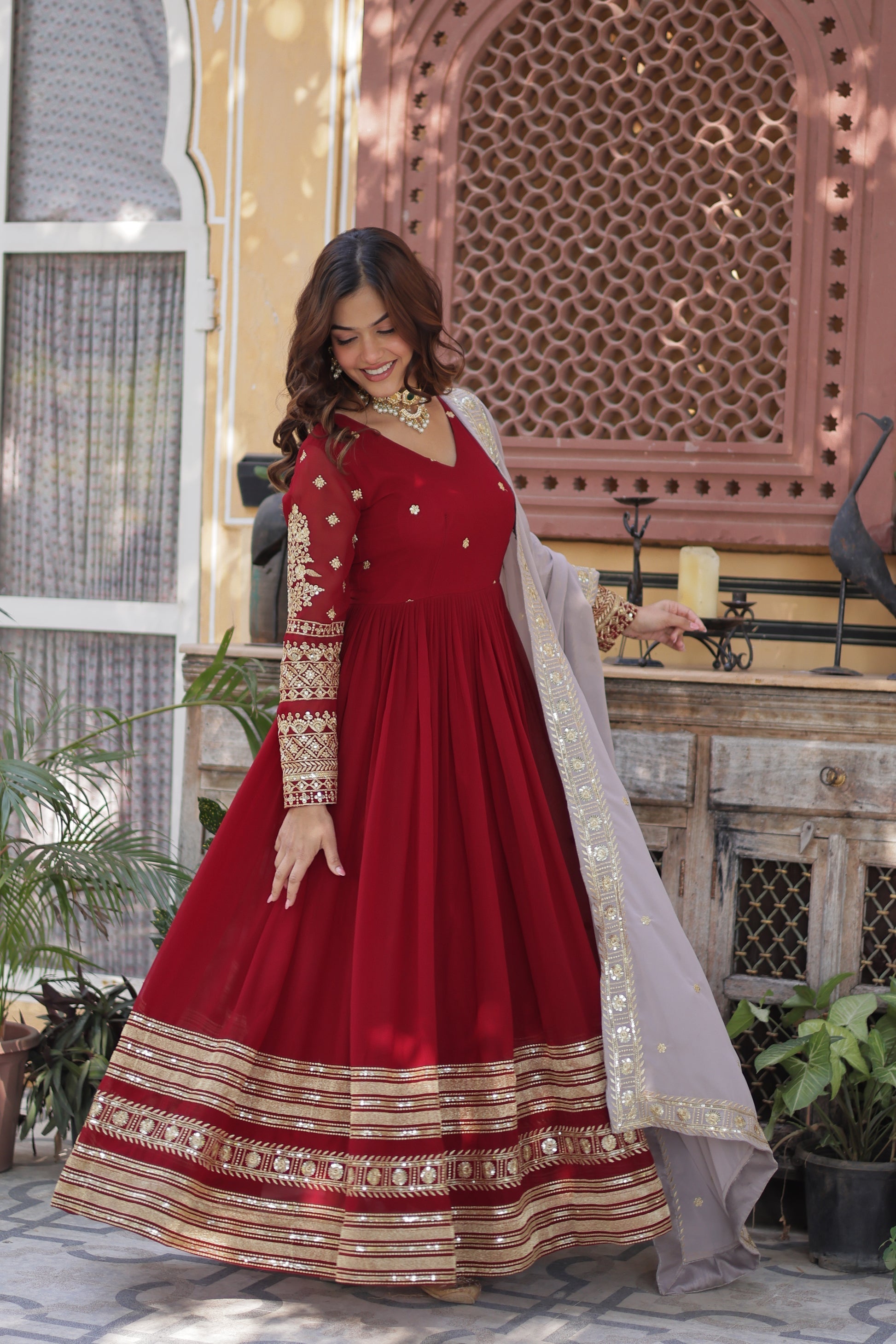 Varshini red embroidered anarkali gown set