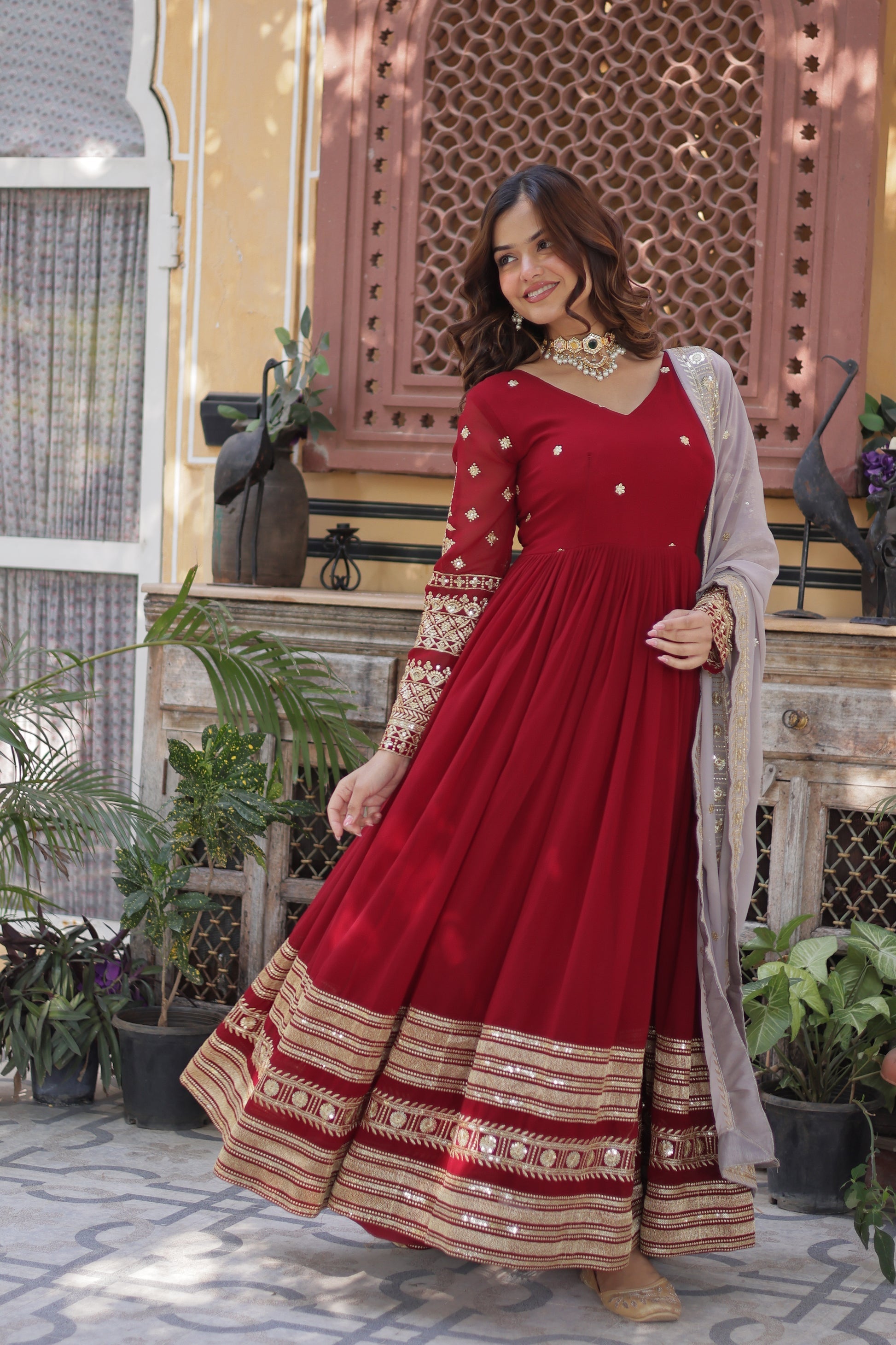 Varshini red embroidered anarkali gown set