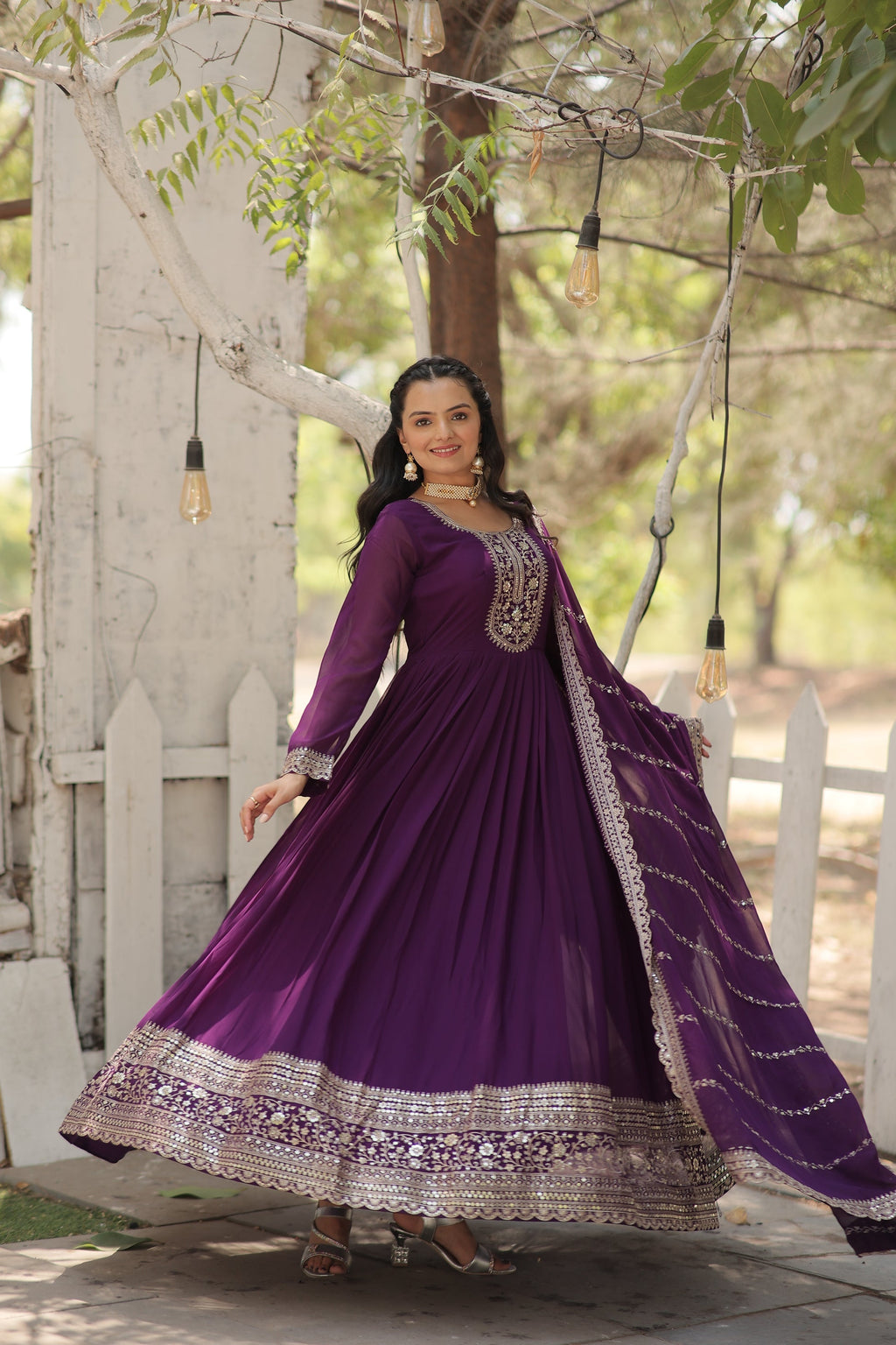 Vasundhara purple faux blooming Anarkali gown suit set
