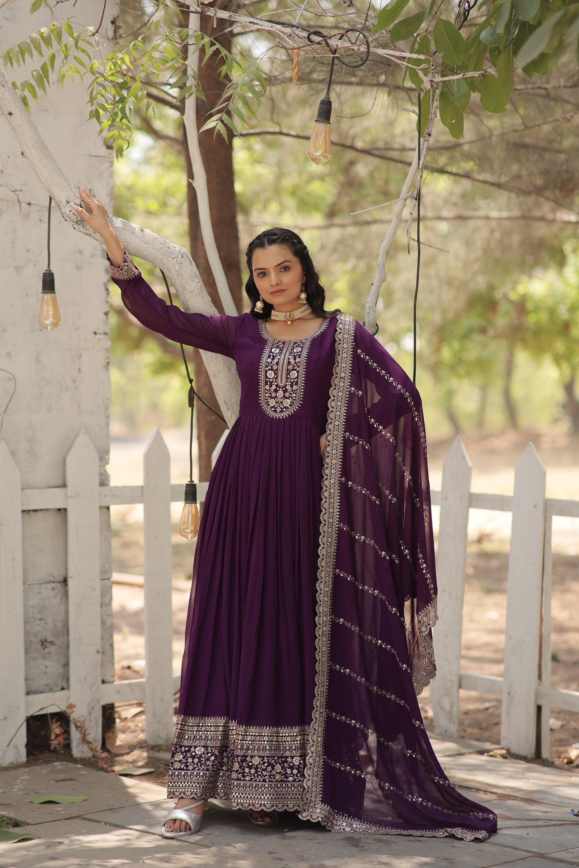 Vasundhara purple faux blooming Anarkali gown suit set
