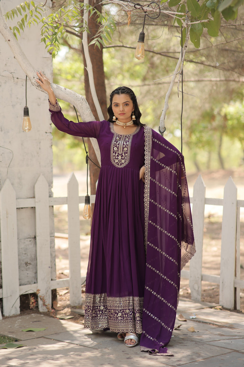 Vasundhara purple faux blooming Anarkali gown suit set