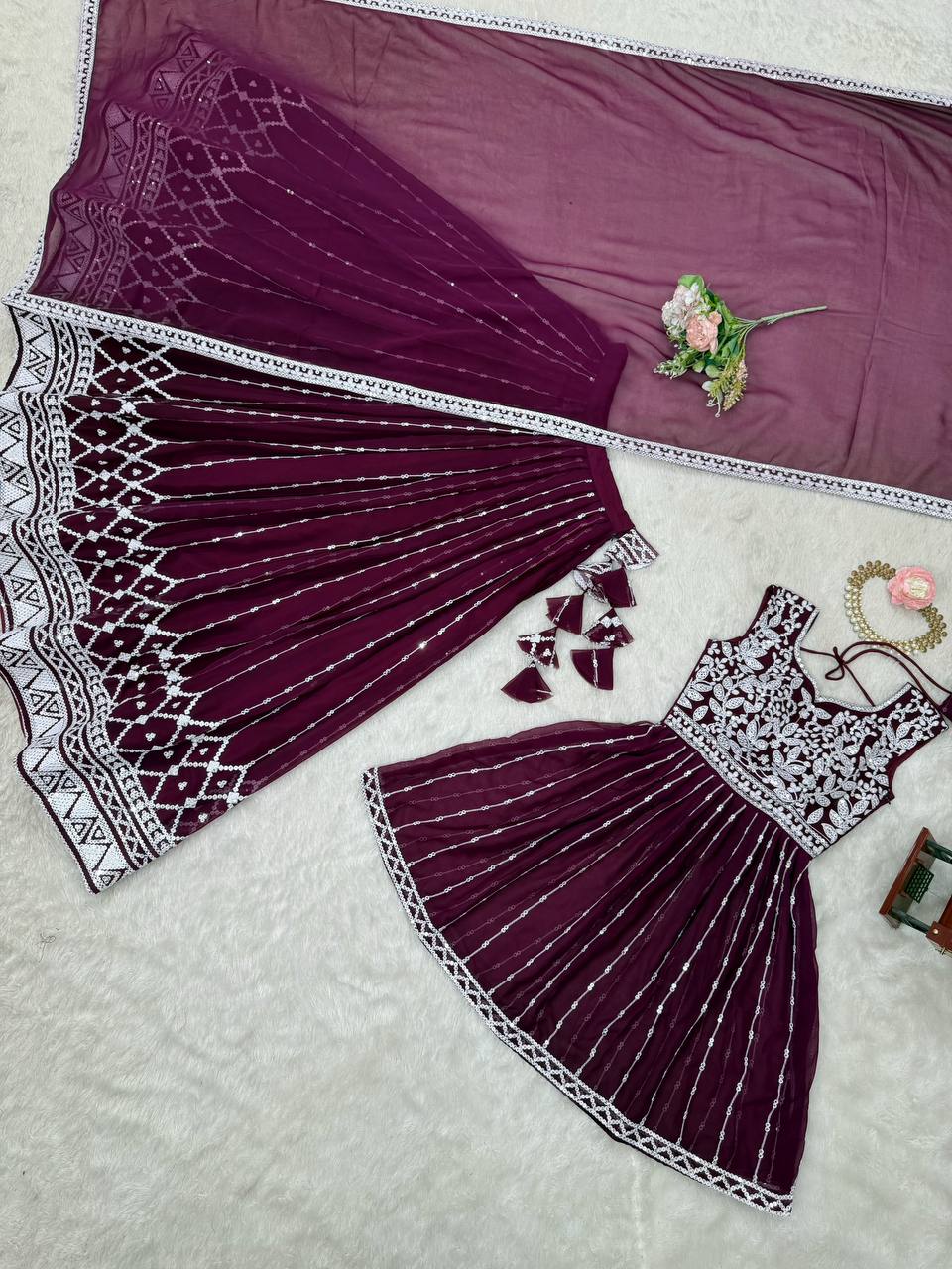 Wine coloured georgette sequin embroidered lehenga with top
