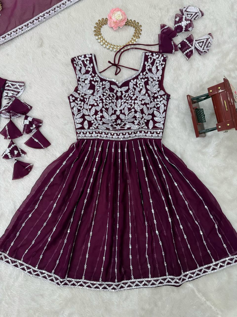 Wine coloured georgette sequin embroidered lehenga with top