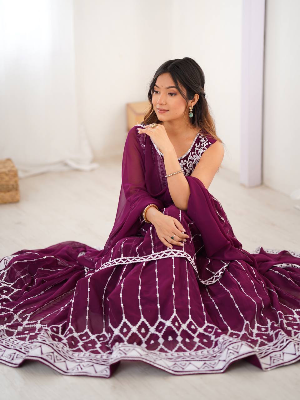 Wine coloured georgette sequin embroidered lehenga with top