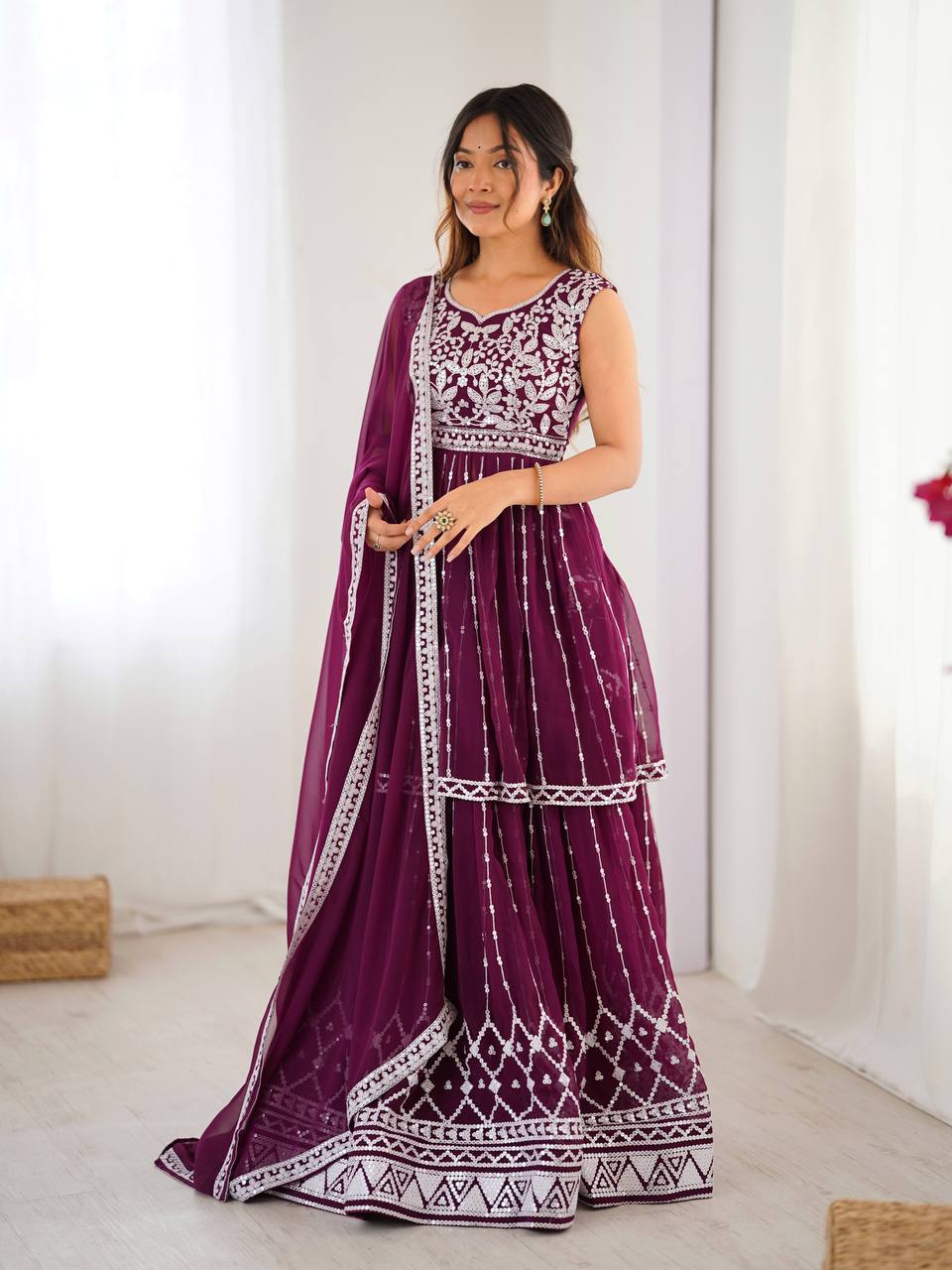 Wine coloured georgette sequin embroidered lehenga with top