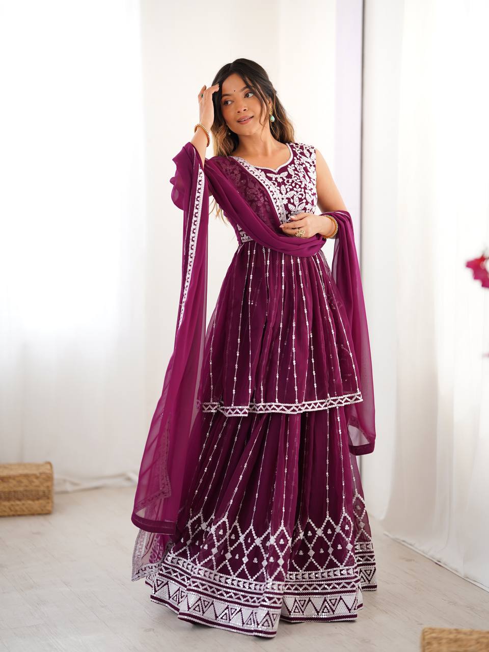 Wine coloured georgette sequin embroidered lehenga with top