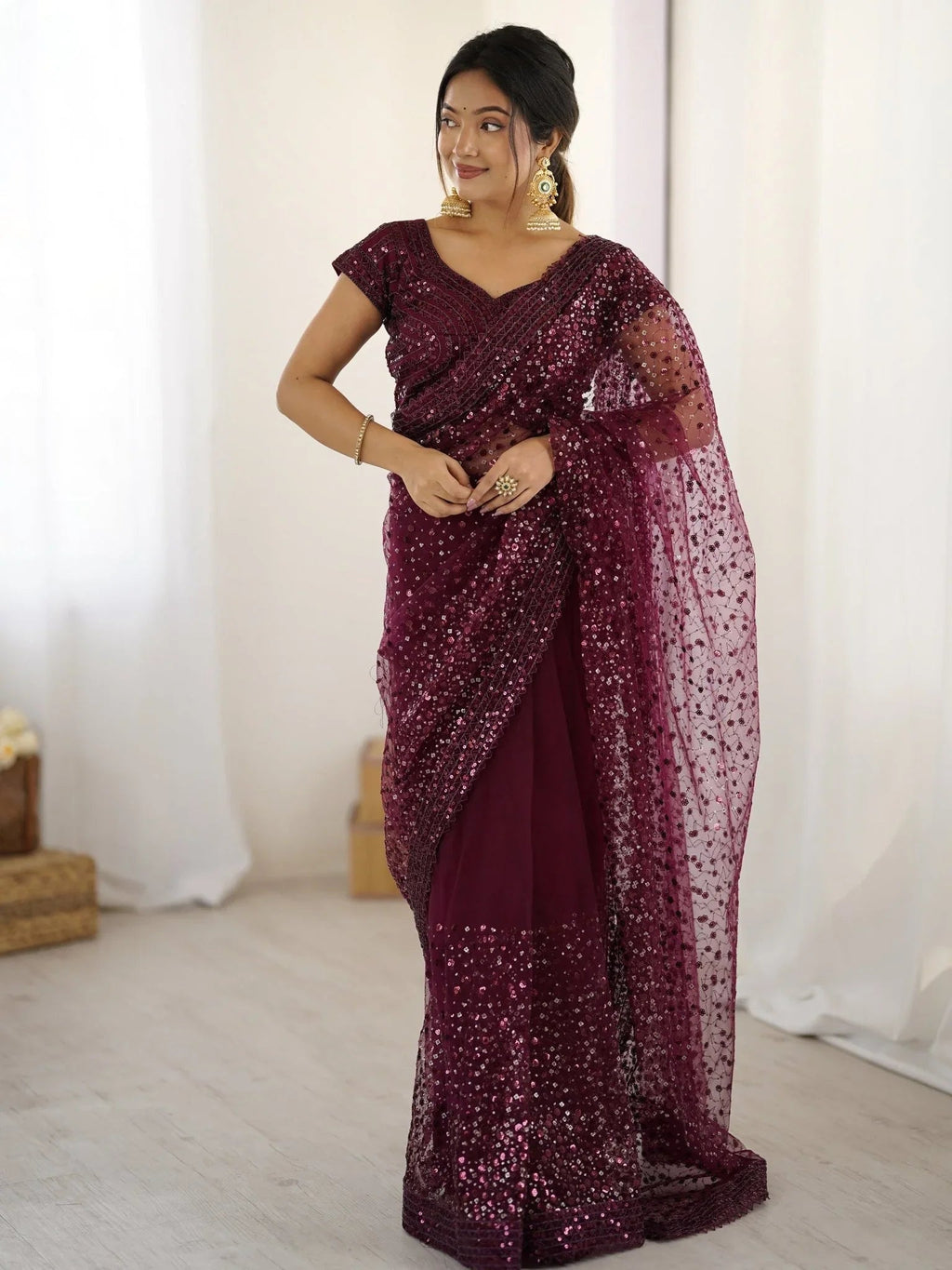Wine net saree with sequins embroidery and blouse