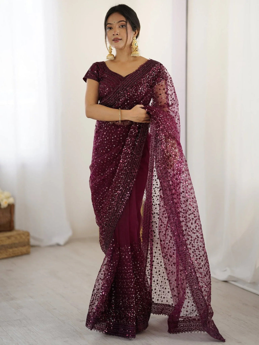 Wine net saree with sequins embroidery and blouse