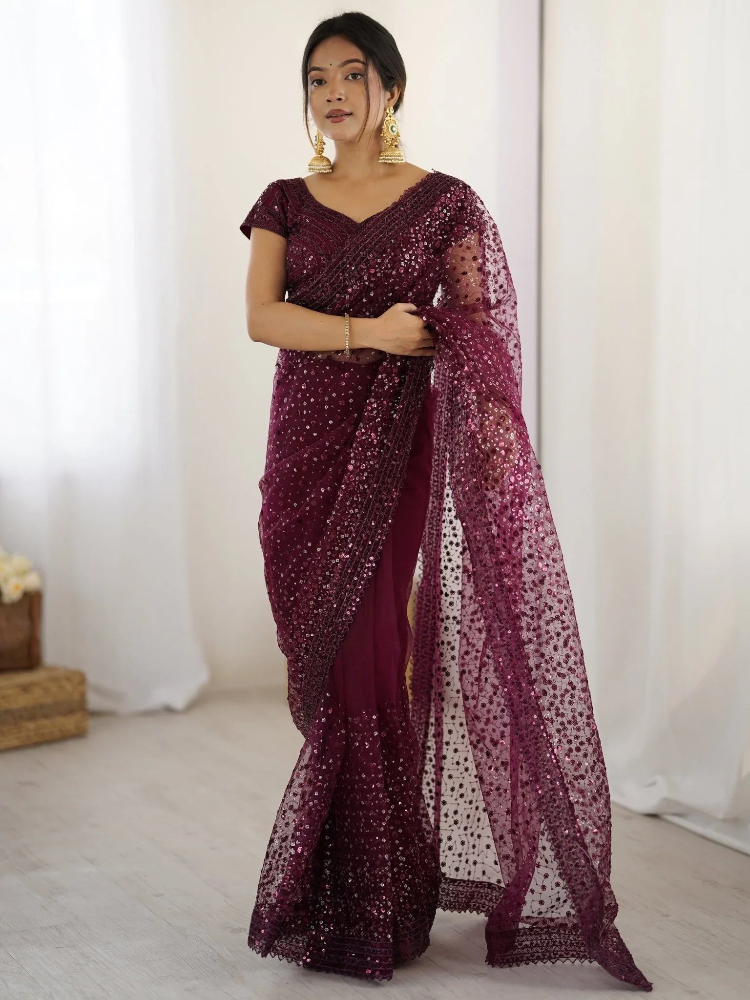 Wine net saree with sequins embroidery and blouse