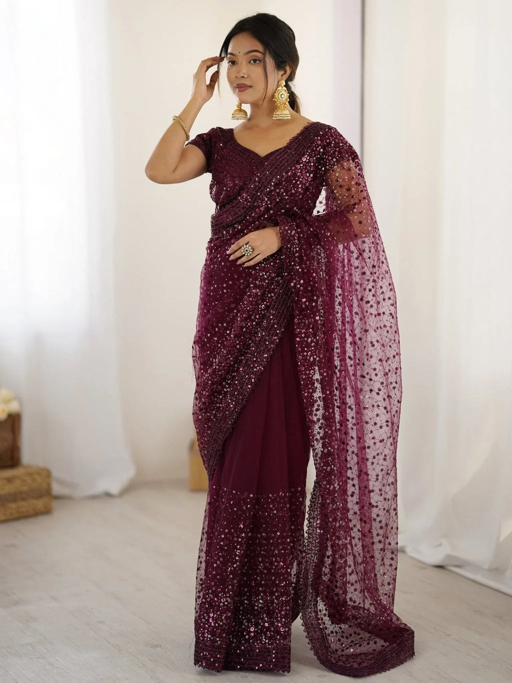 Wine net saree with sequins embroidery and blouse