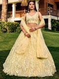 Yellow net sequins embroidered party wear lehenga choli