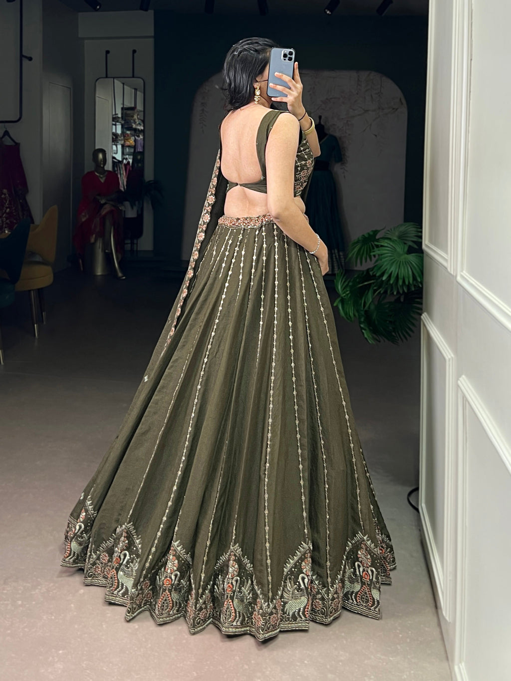 Zarakh olive green silk lehenga choli with sequins thread embroidery work