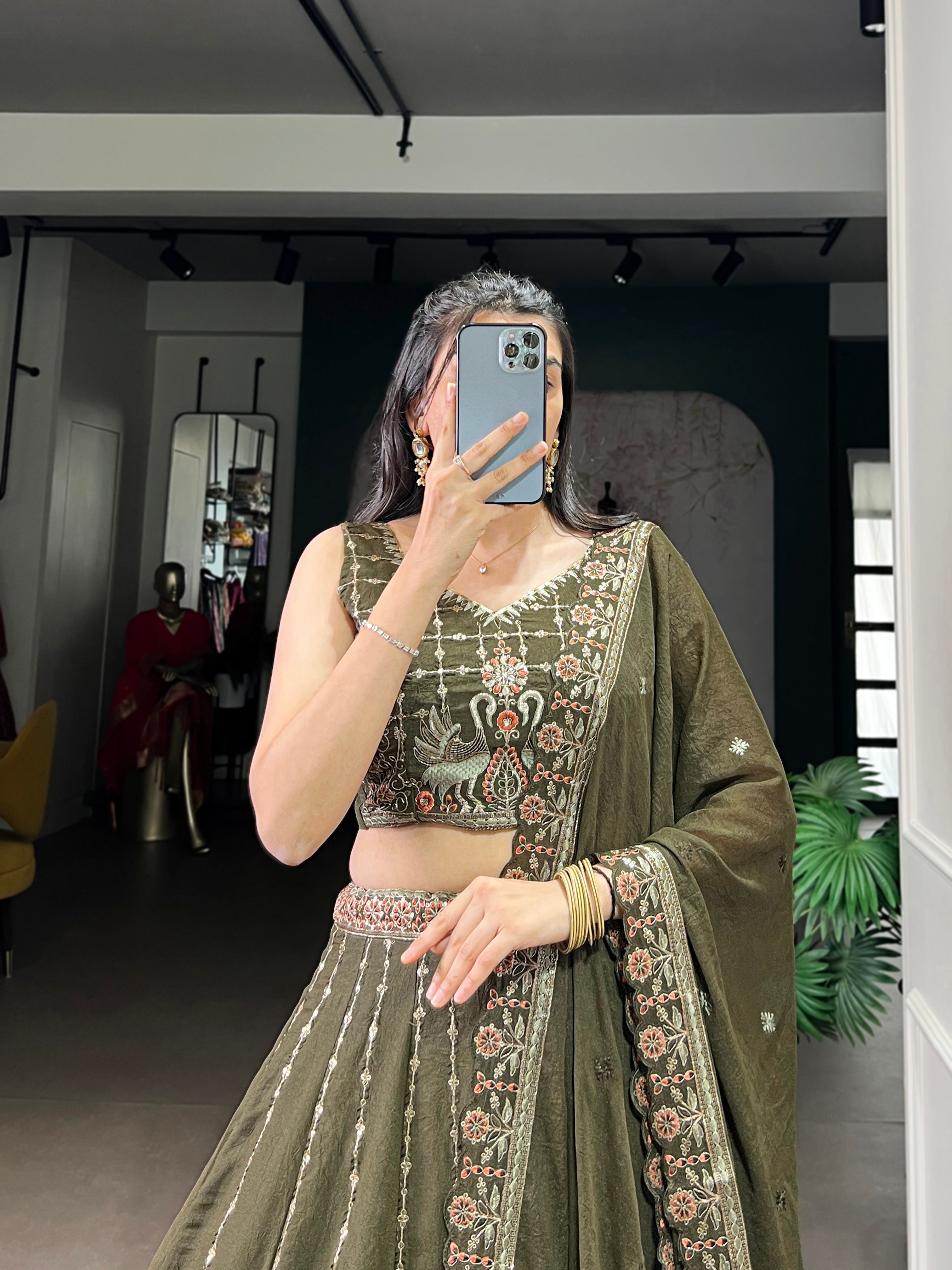 Zarakh olive green silk lehenga choli with sequins thread embroidery work