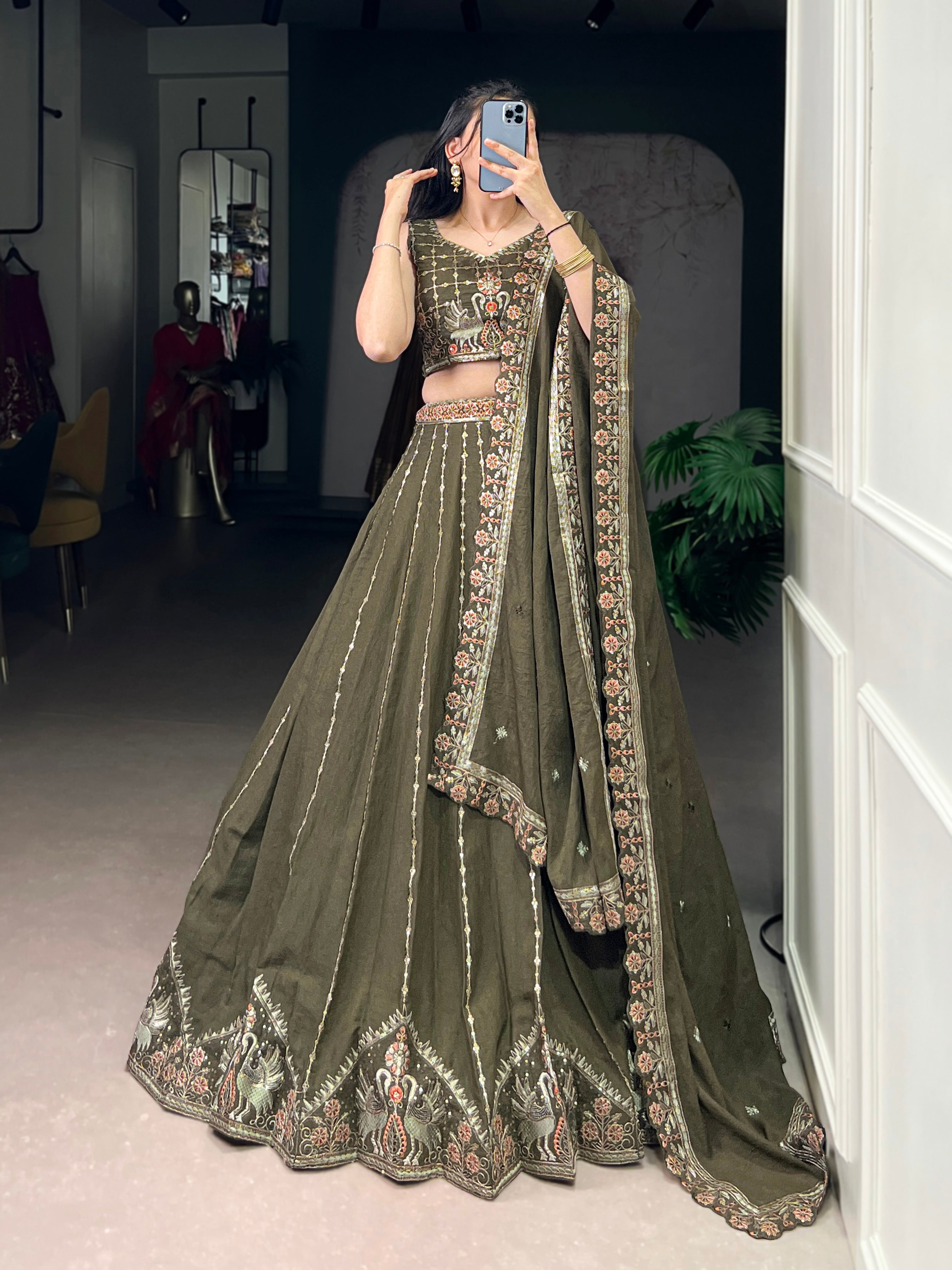 Zarakh olive green silk lehenga choli with sequins thread embroidery work