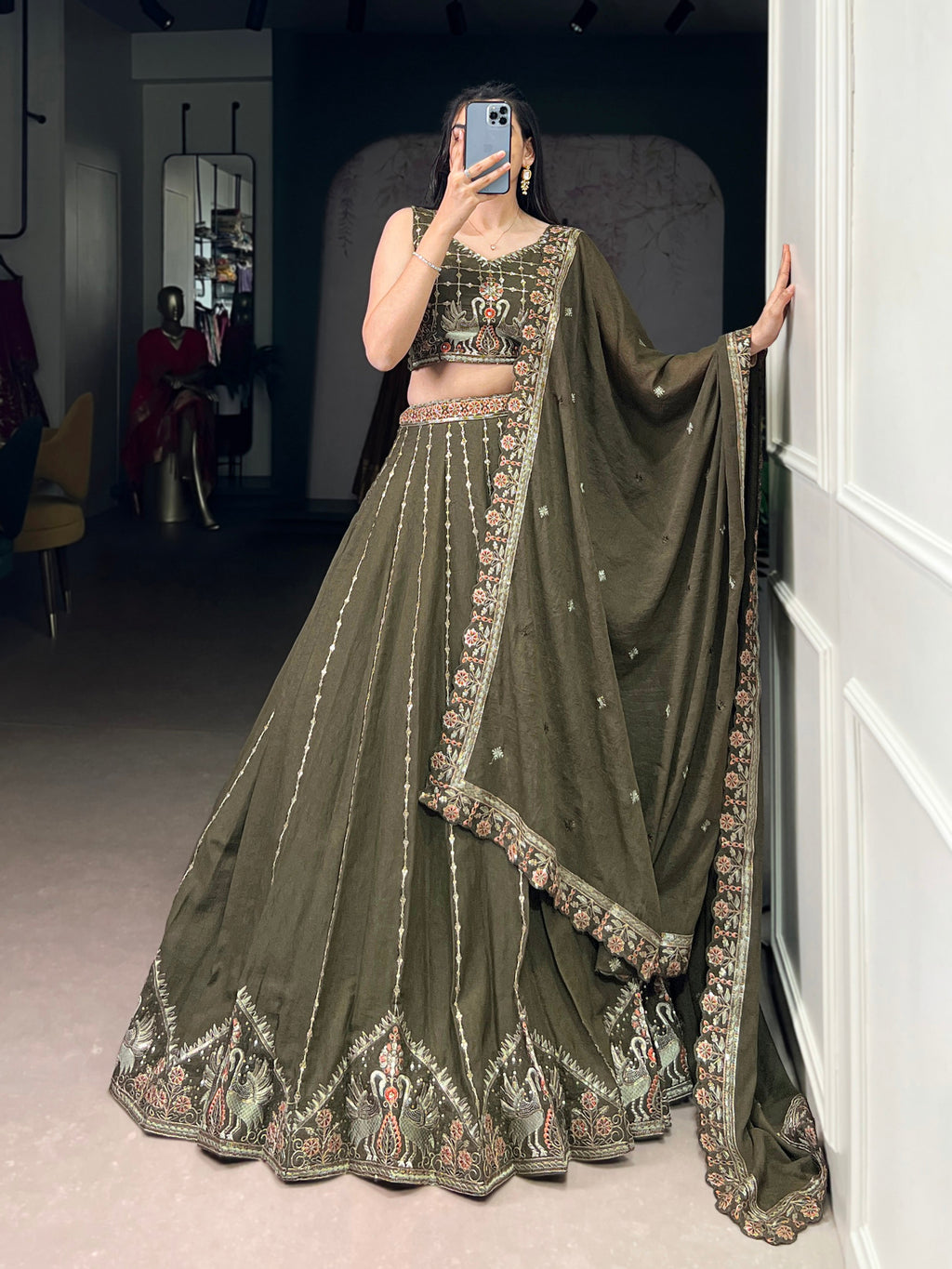 Zarakh olive green silk lehenga choli with sequins thread embroidery work