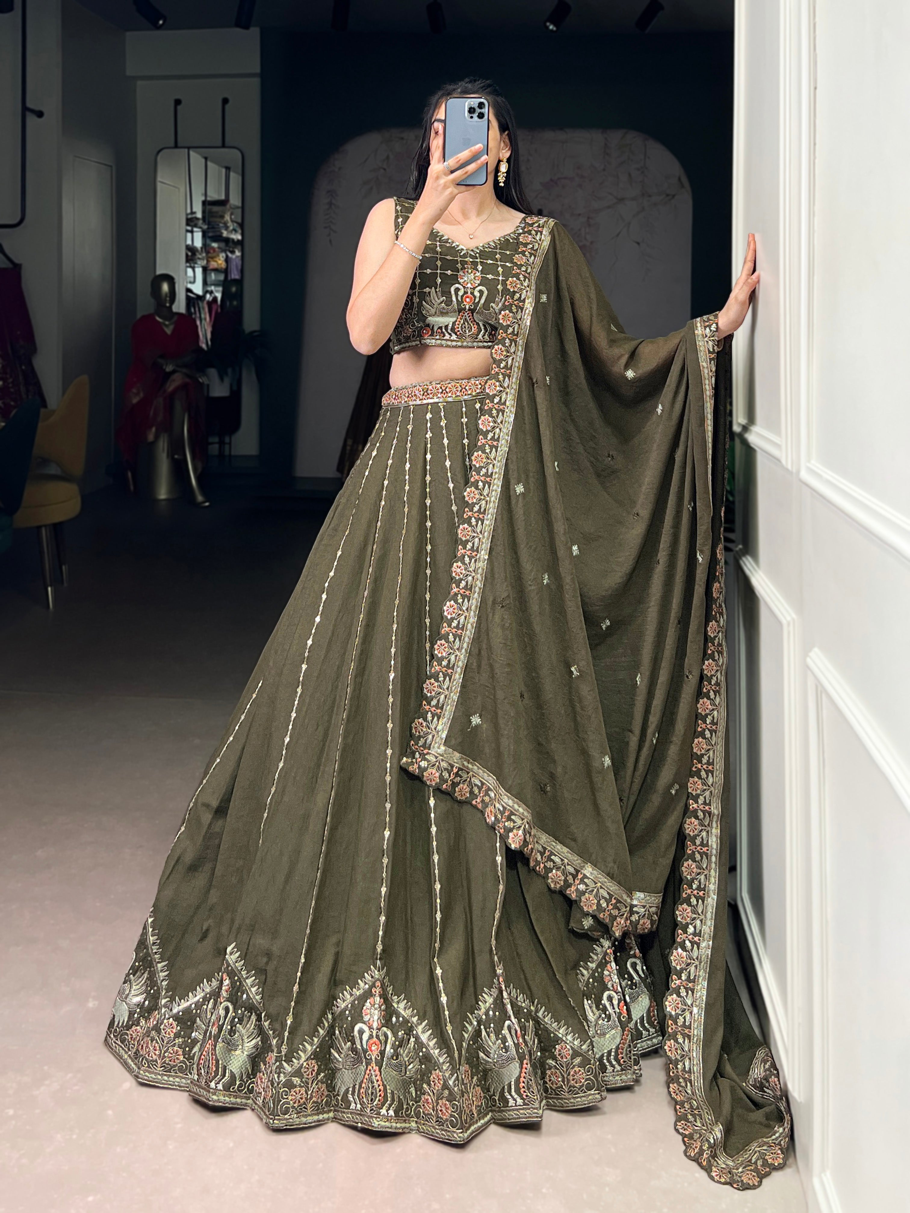 Zarakh olive green silk lehenga choli with sequins thread embroidery work