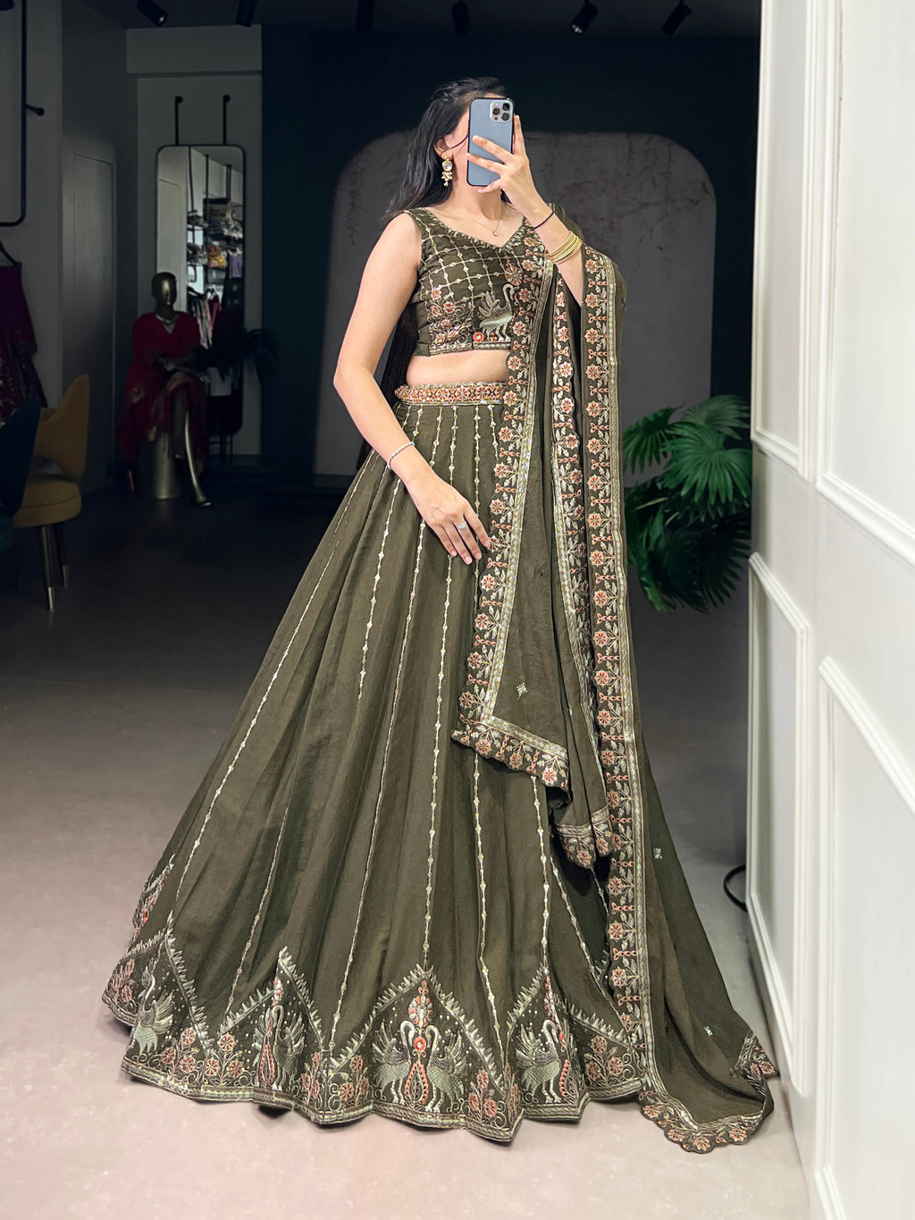 Zarakh olive green silk lehenga choli with sequins thread embroidery work