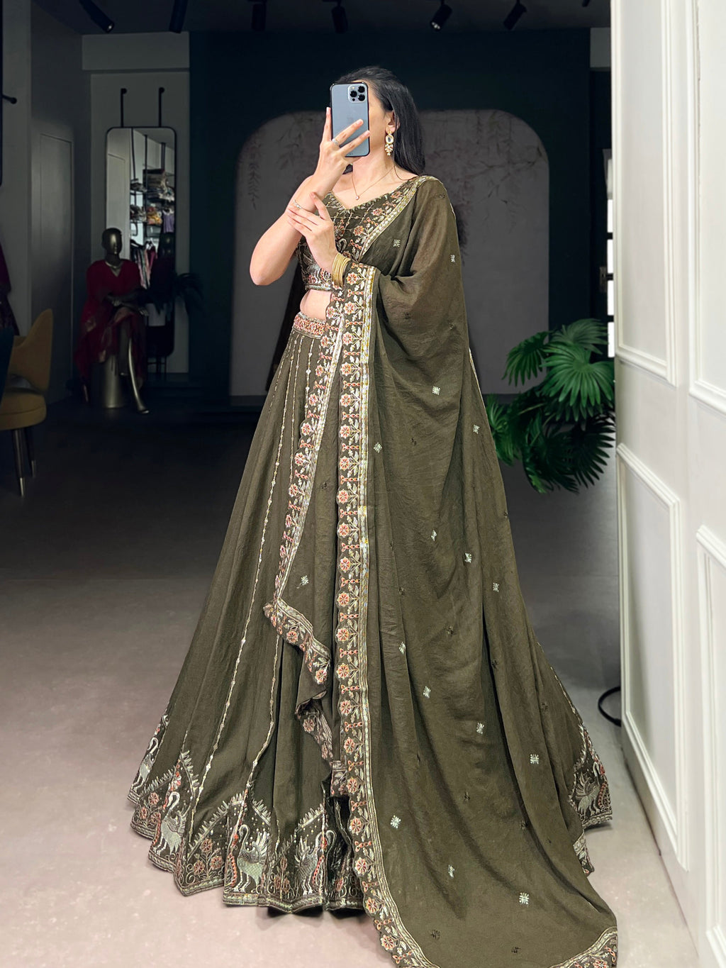 Zarakh olive green silk lehenga choli with sequins thread embroidery work