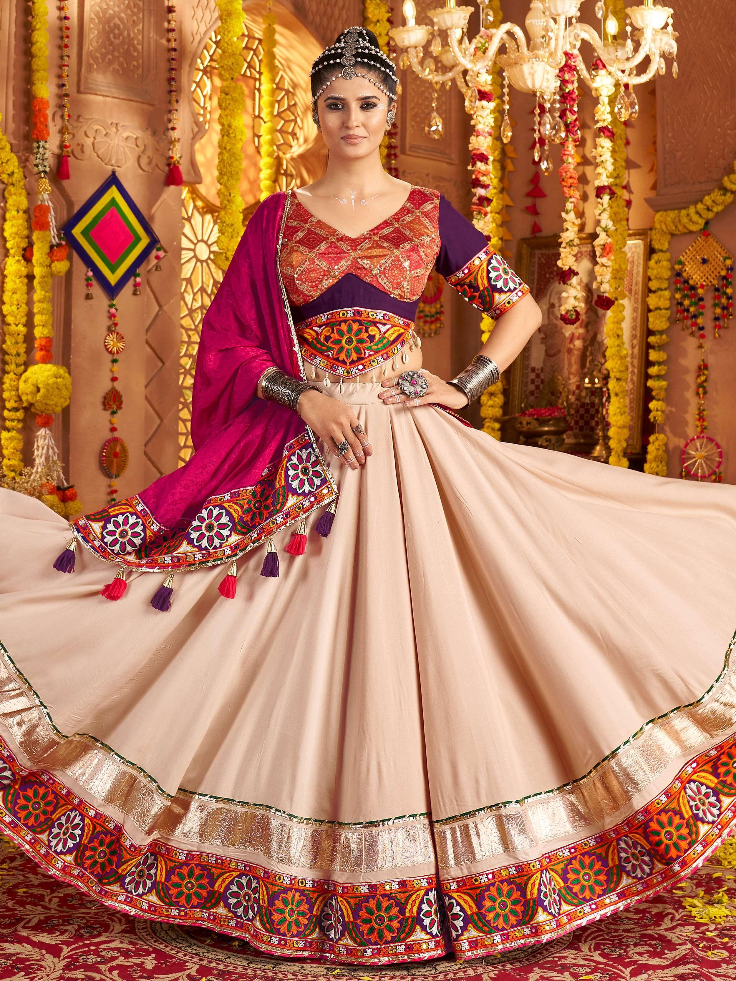 Beige traditional rayon lehenga choli with mirror detailing