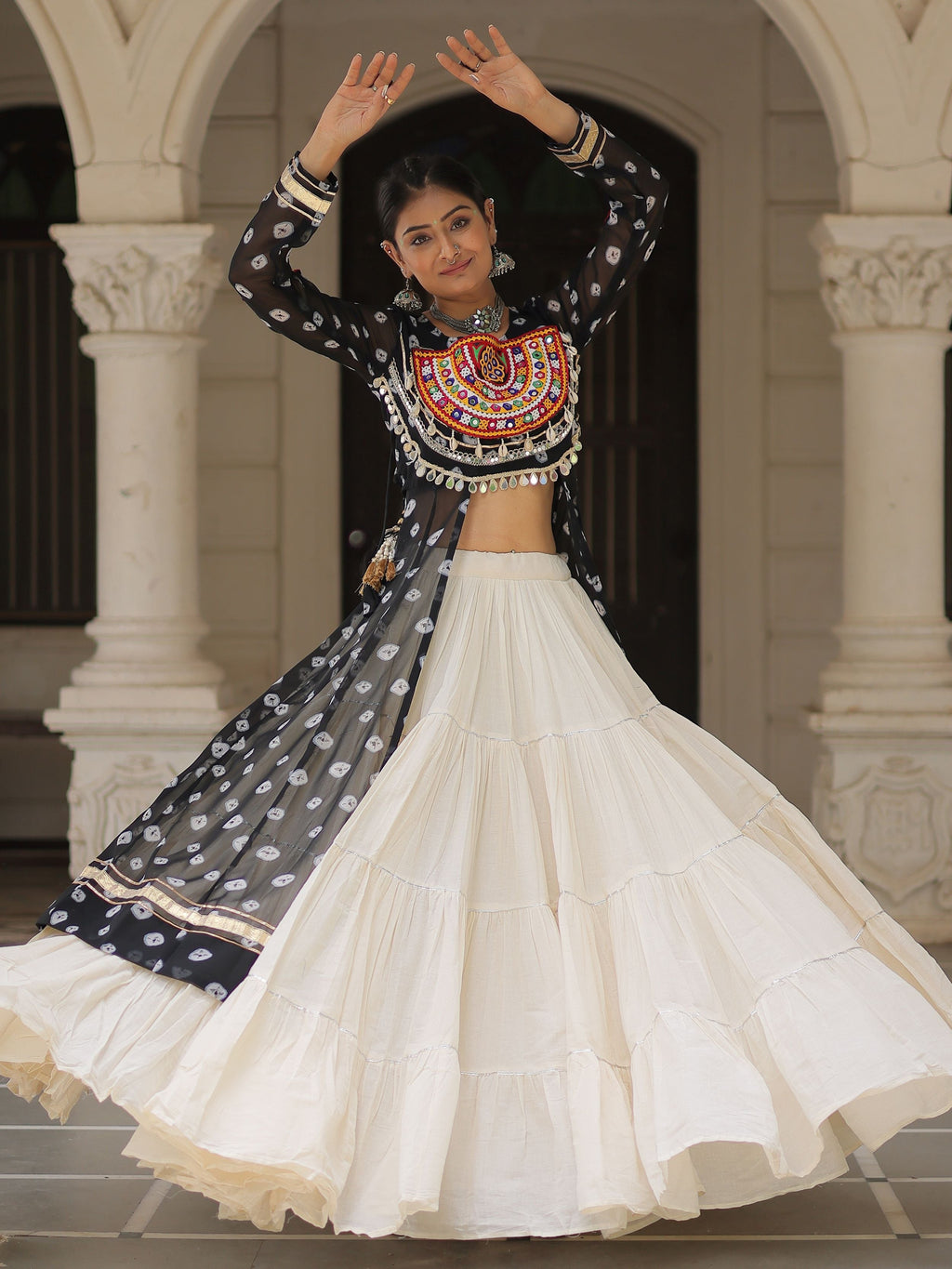 Black bandhani print kurti with kutchi patchwork kora cotton lehenga