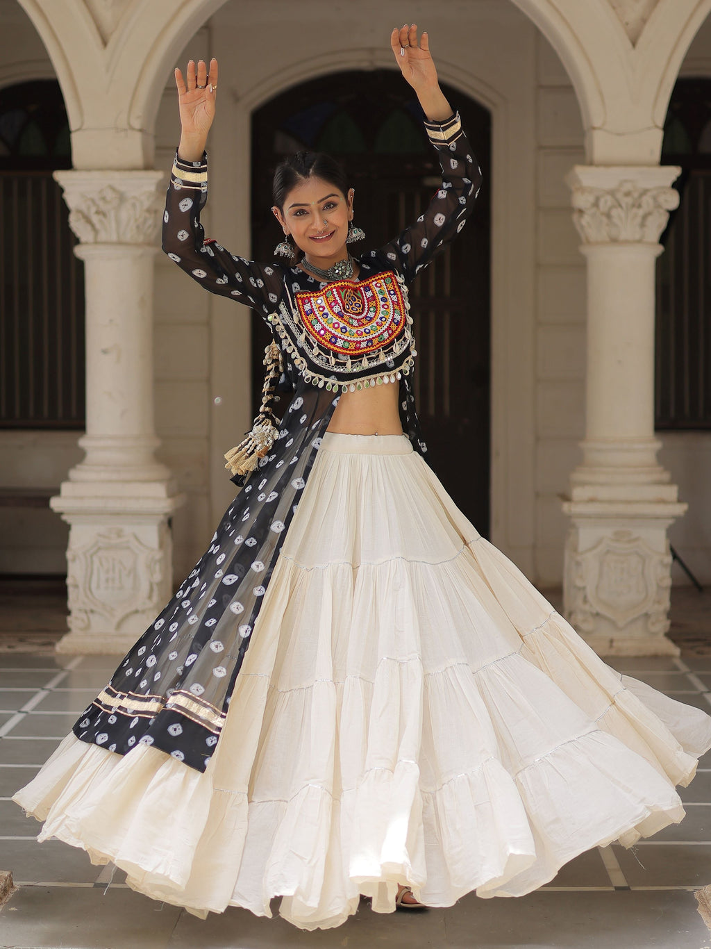 Black bandhani print kurti with kutchi patchwork kora cotton lehenga