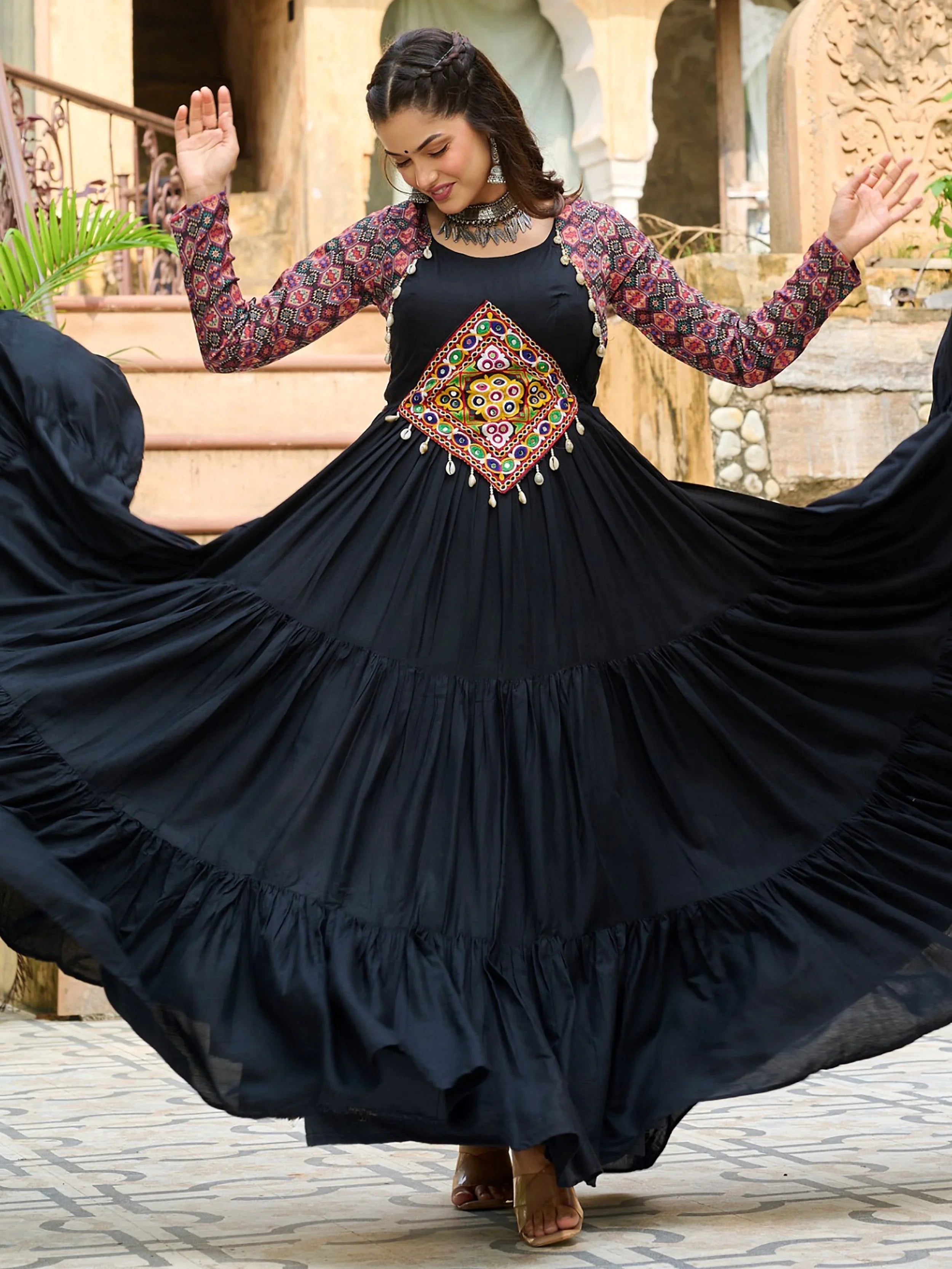                   Black pure rayon flair gown with kutchi gamthi embroidery for navratri