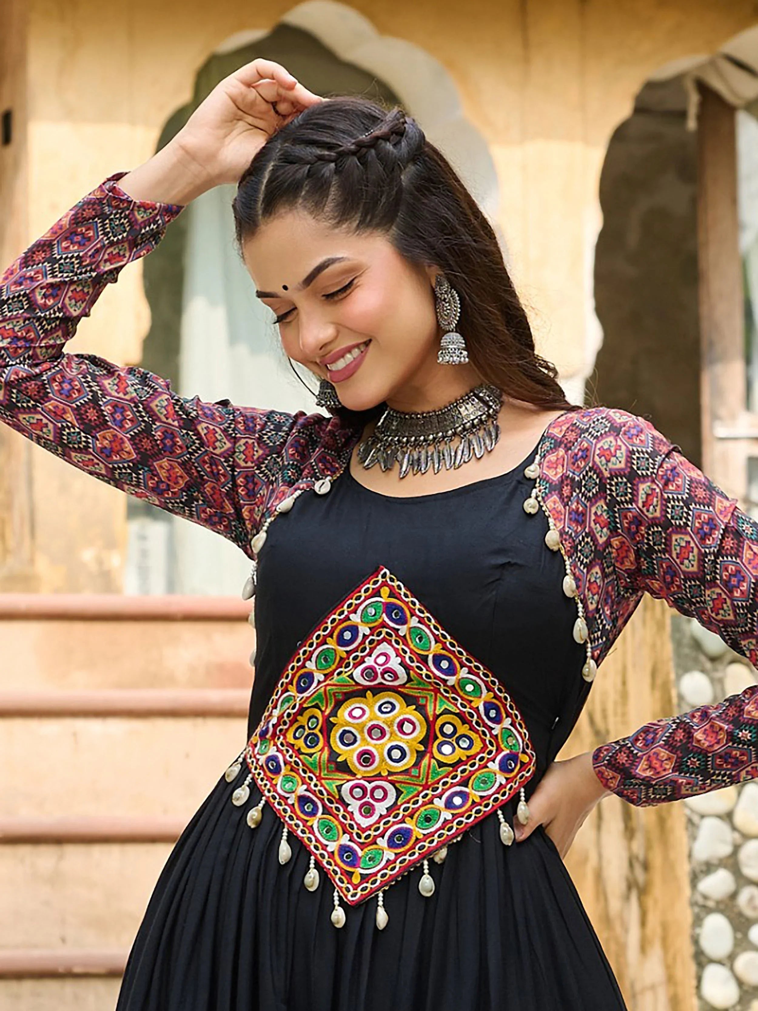 Black pure rayon flair gown with kutchi gamthi embroidery for navratri
