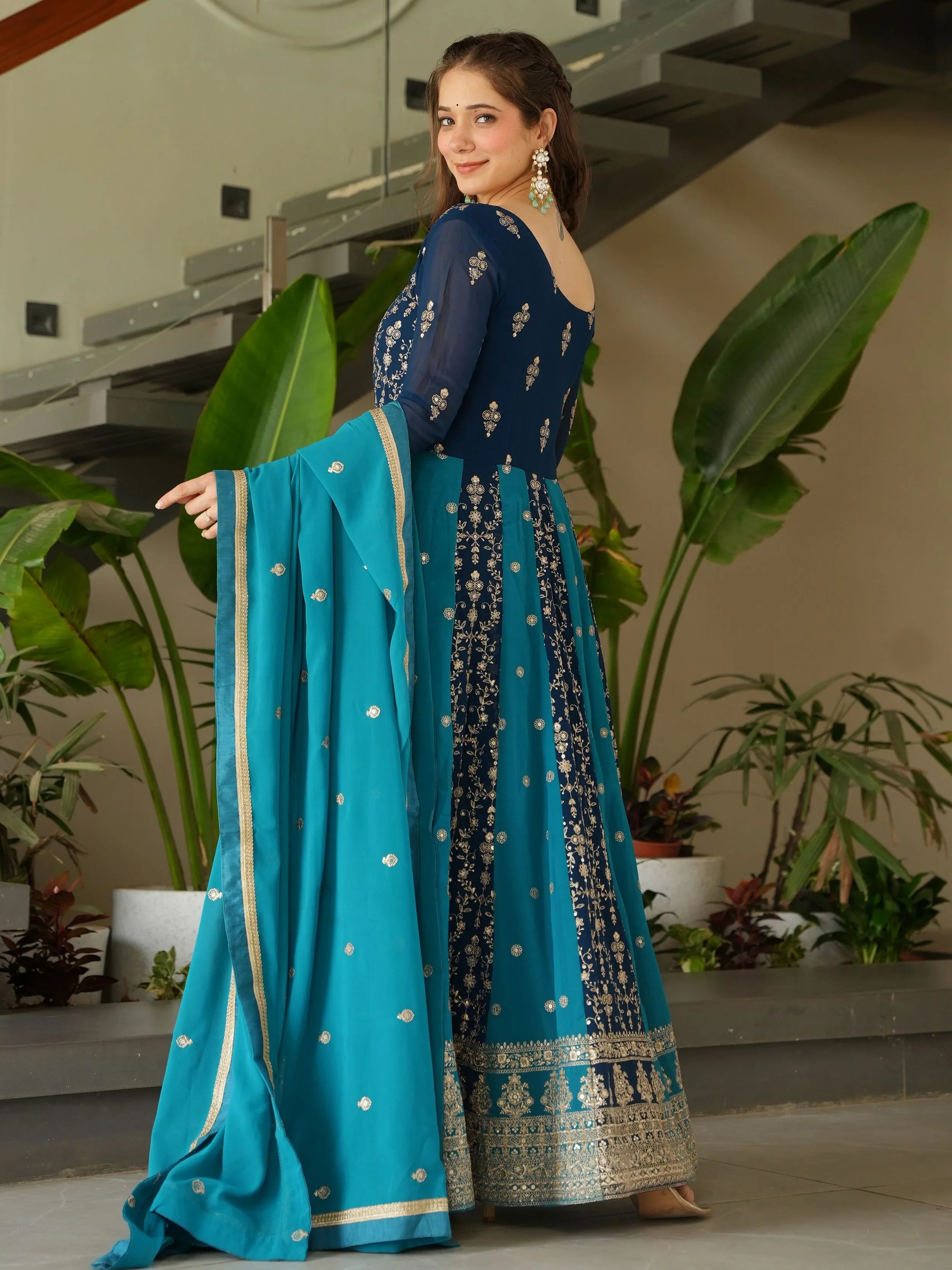 Blue georgette gown with zari and sequins embroidery and dupatta