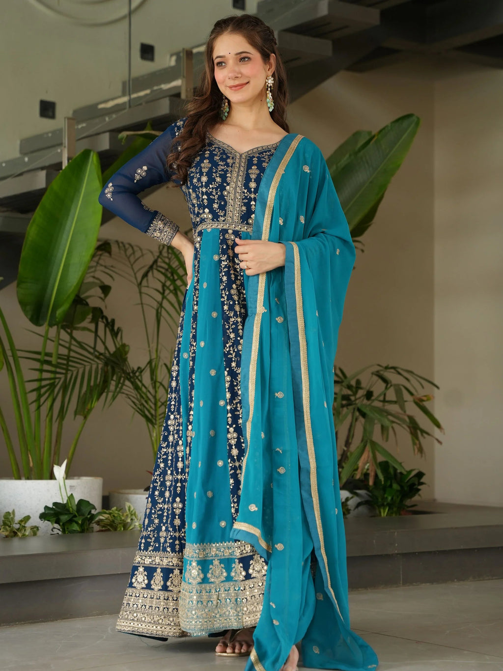 Blue georgette gown with zari and sequins embroidery and dupatta