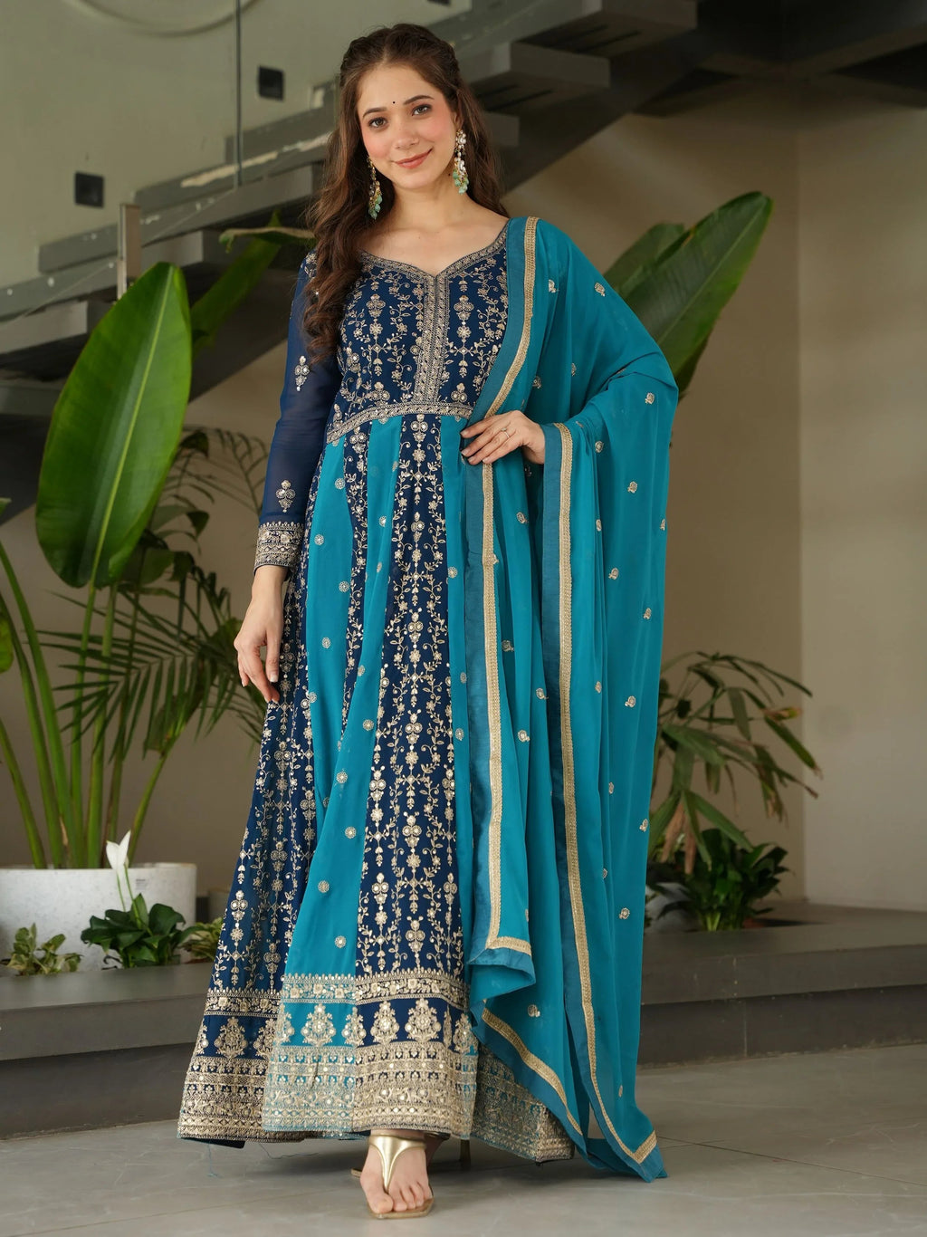 Blue georgette gown with zari and sequins embroidery and dupatta
