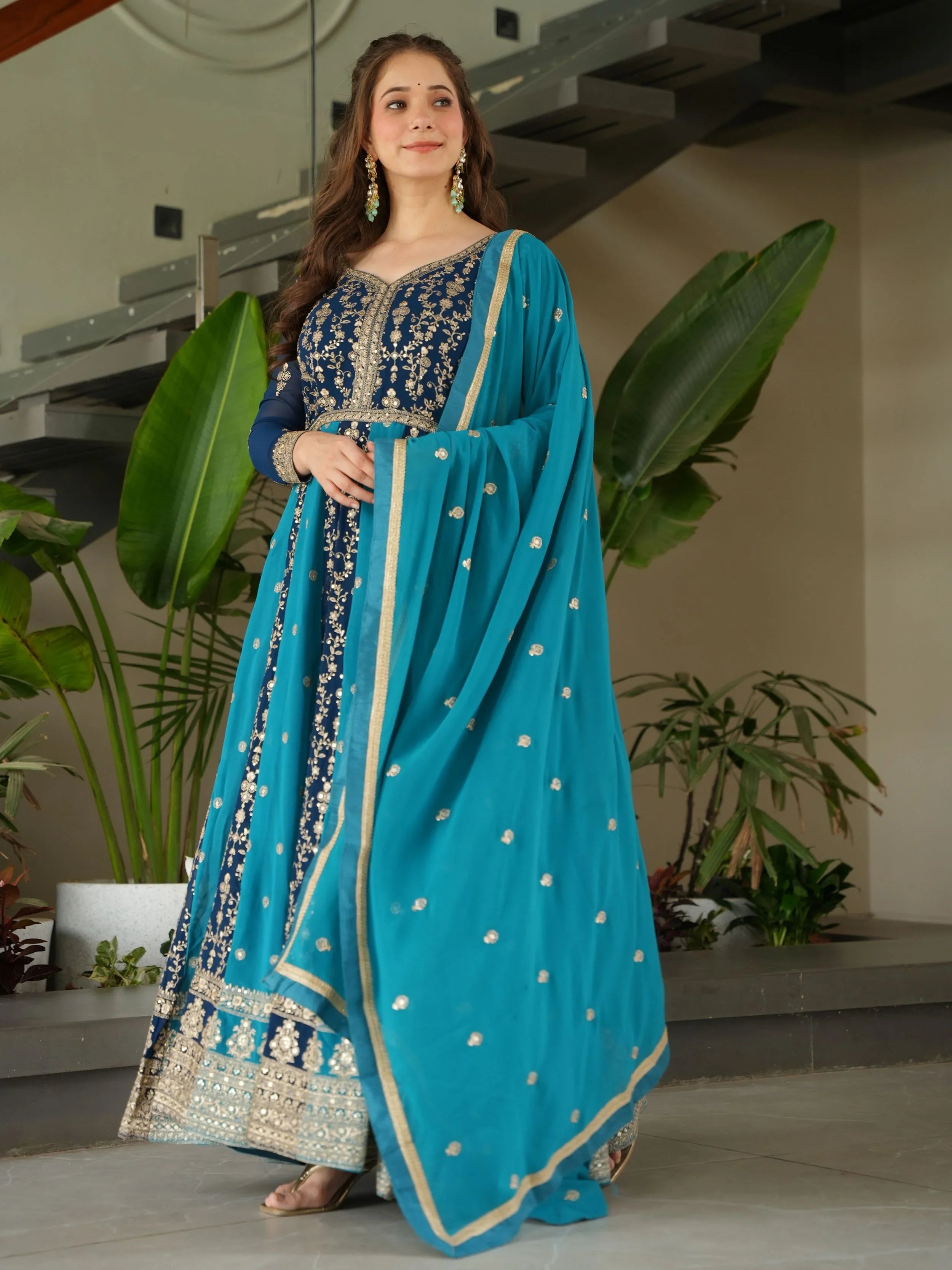 Blue georgette gown with zari and sequins embroidery and dupatta