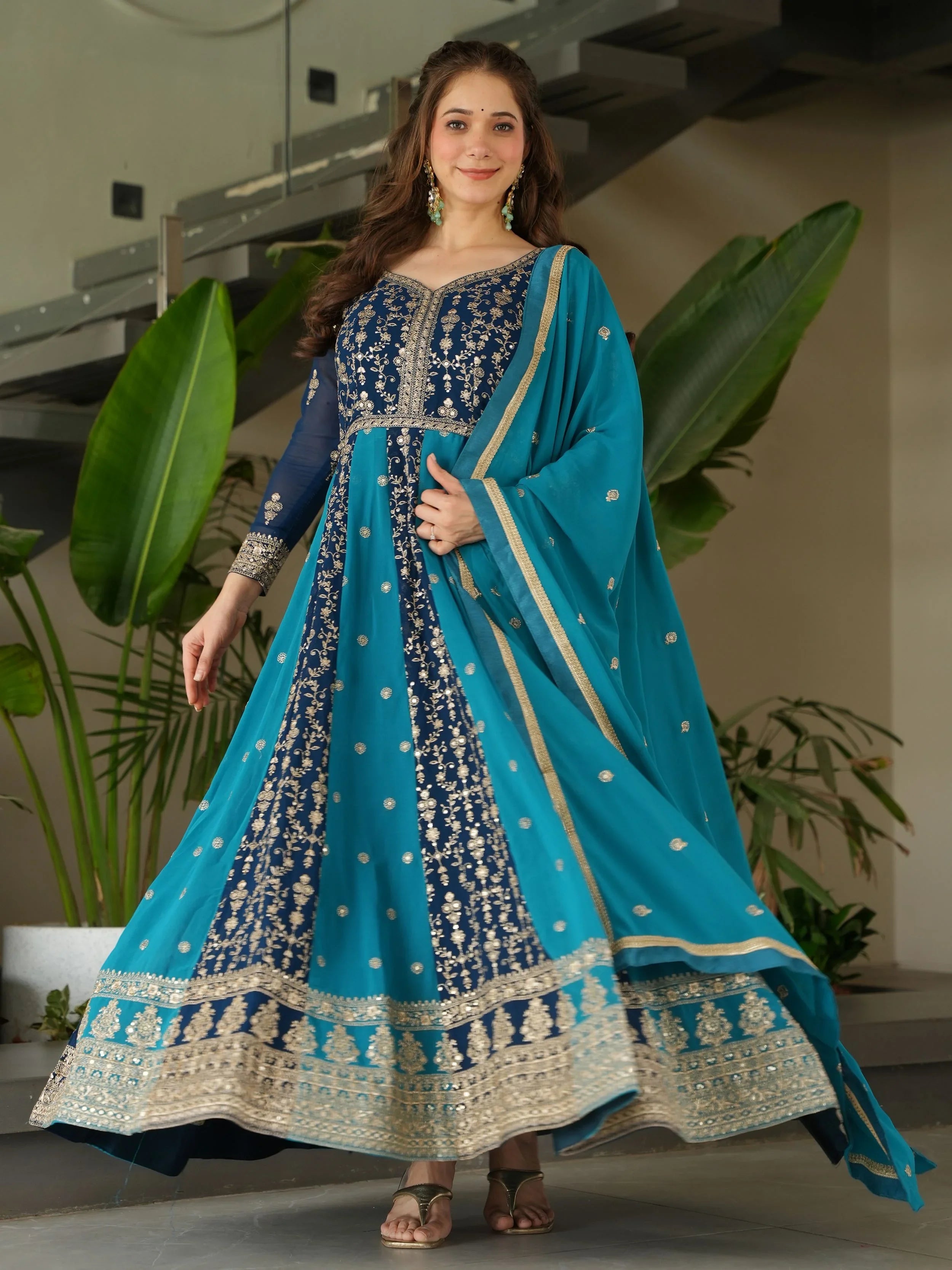 Blue georgette gown with zari and sequins embroidery and dupatta