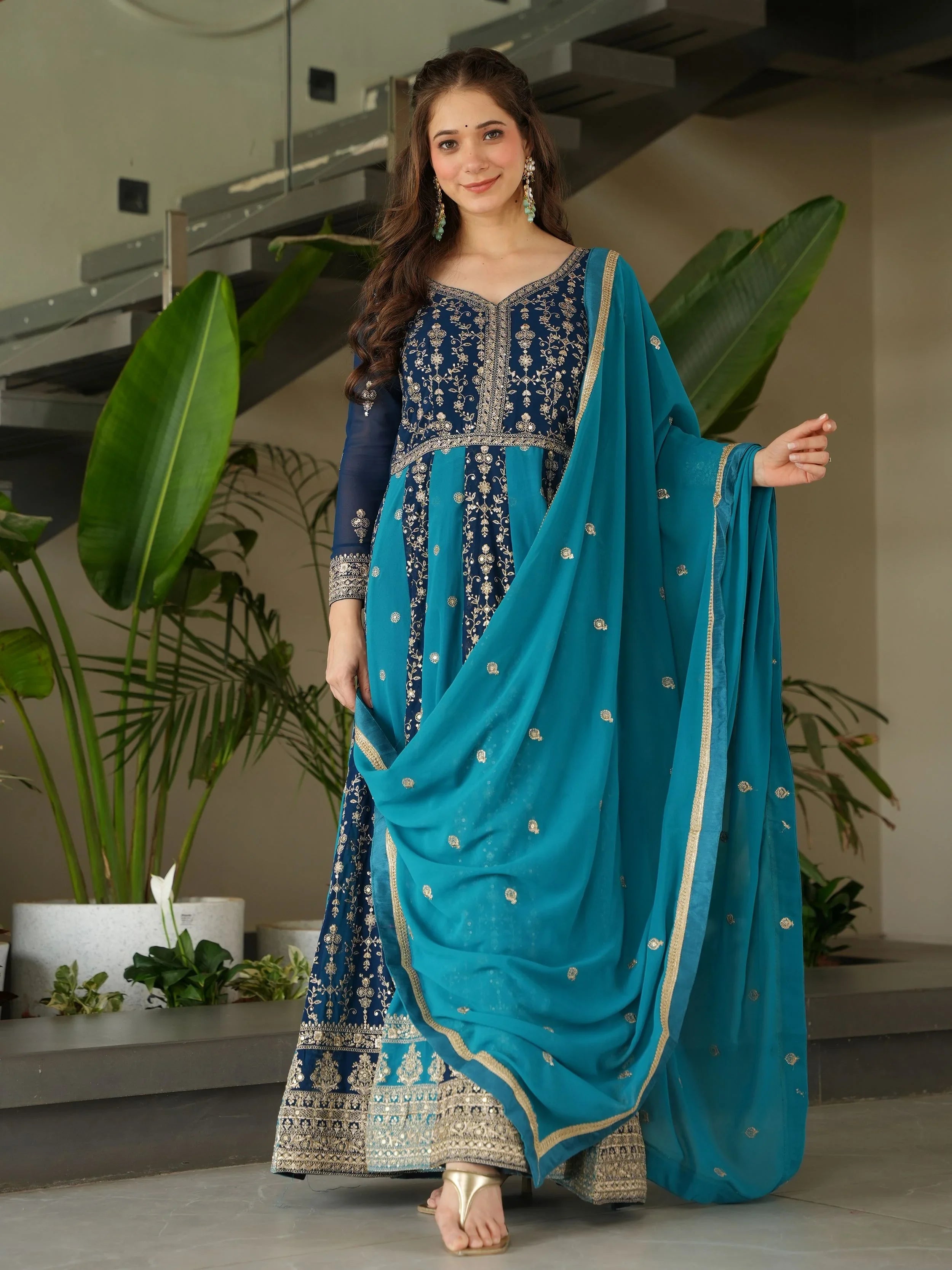Blue georgette gown with zari and sequins embroidery and dupatta