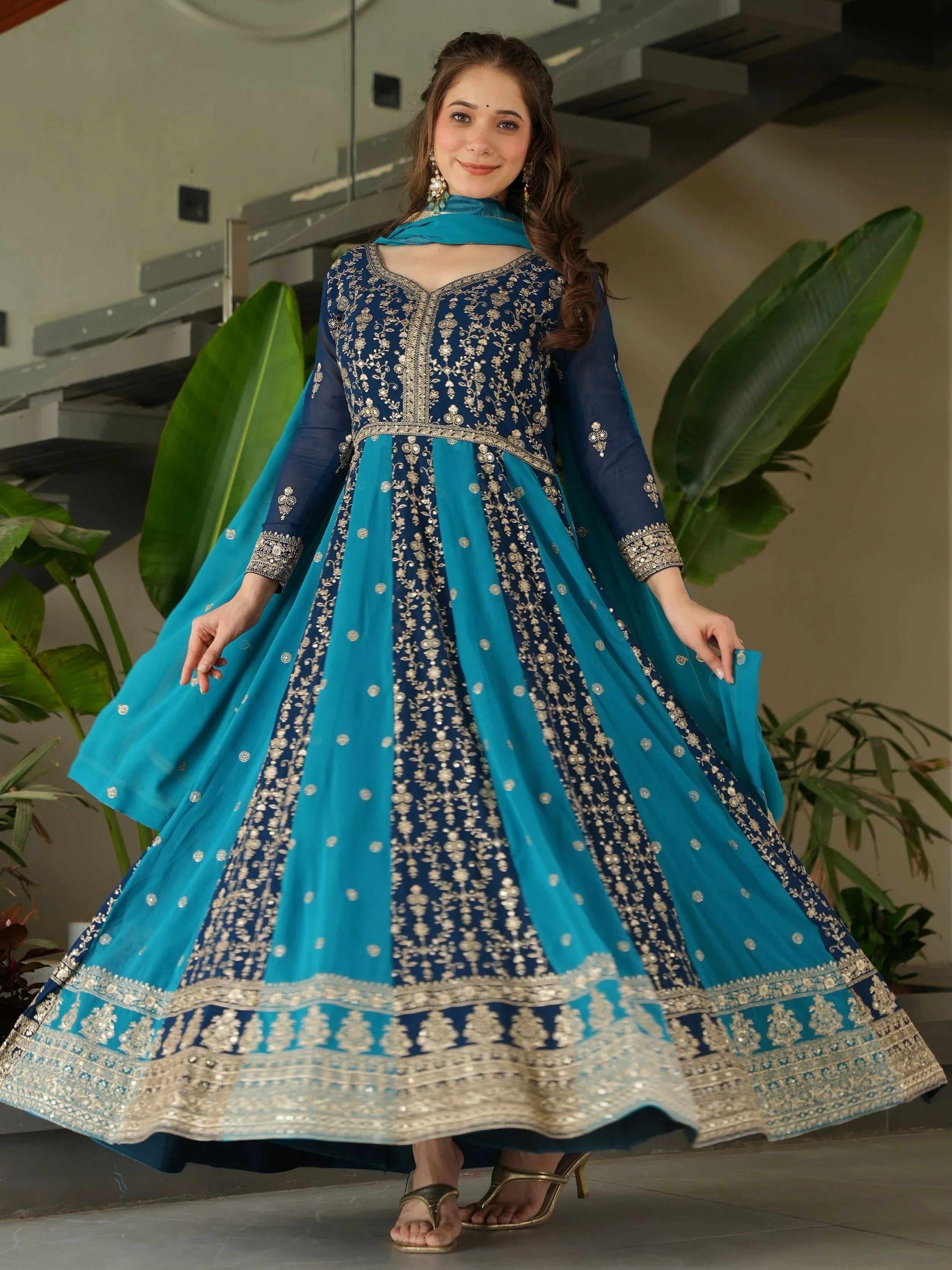 Blue georgette gown with zari and sequins embroidery and dupatta