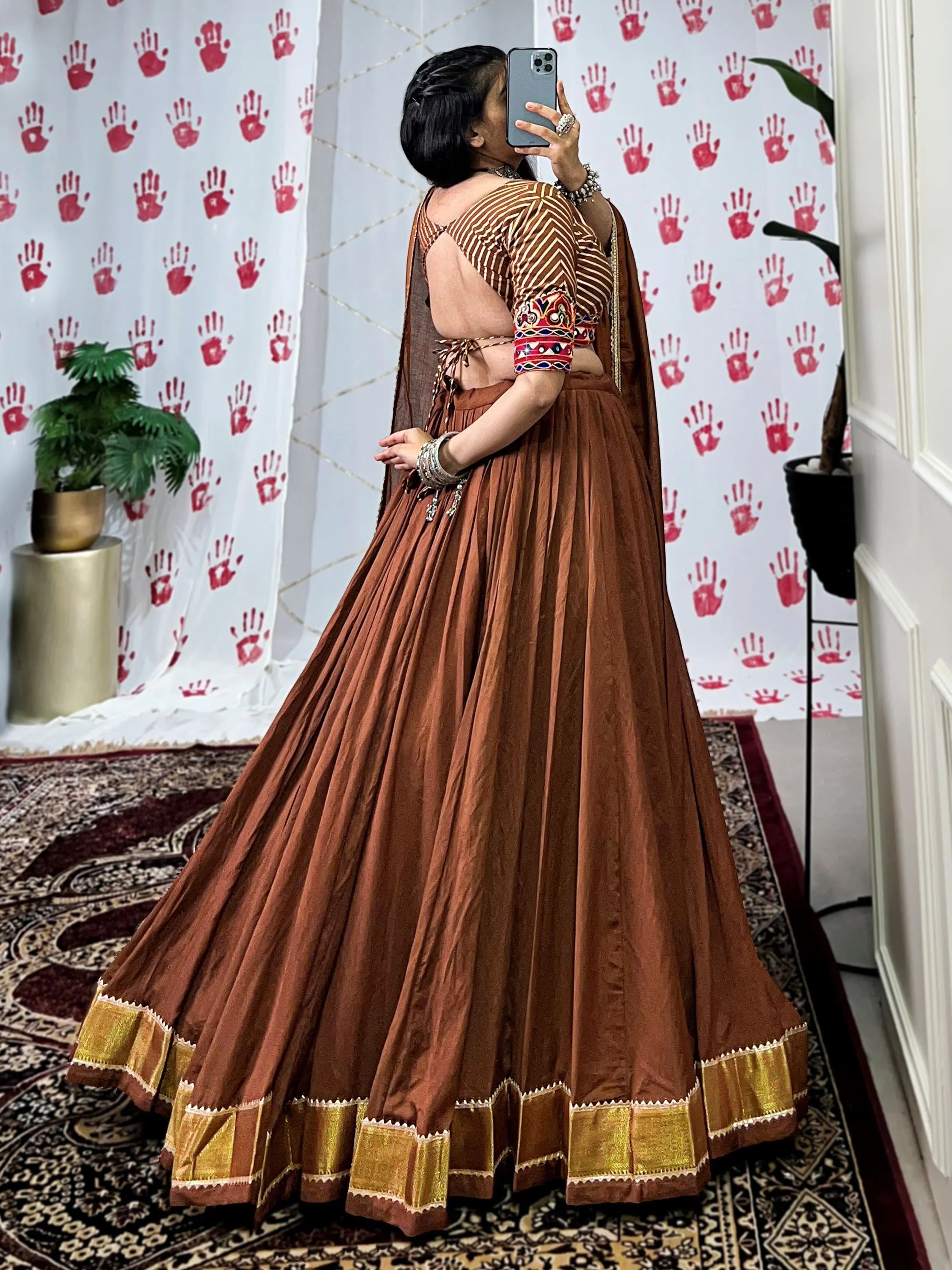 Brown pure chanderi lehenga choli with zari weaving and mirror gamthi work