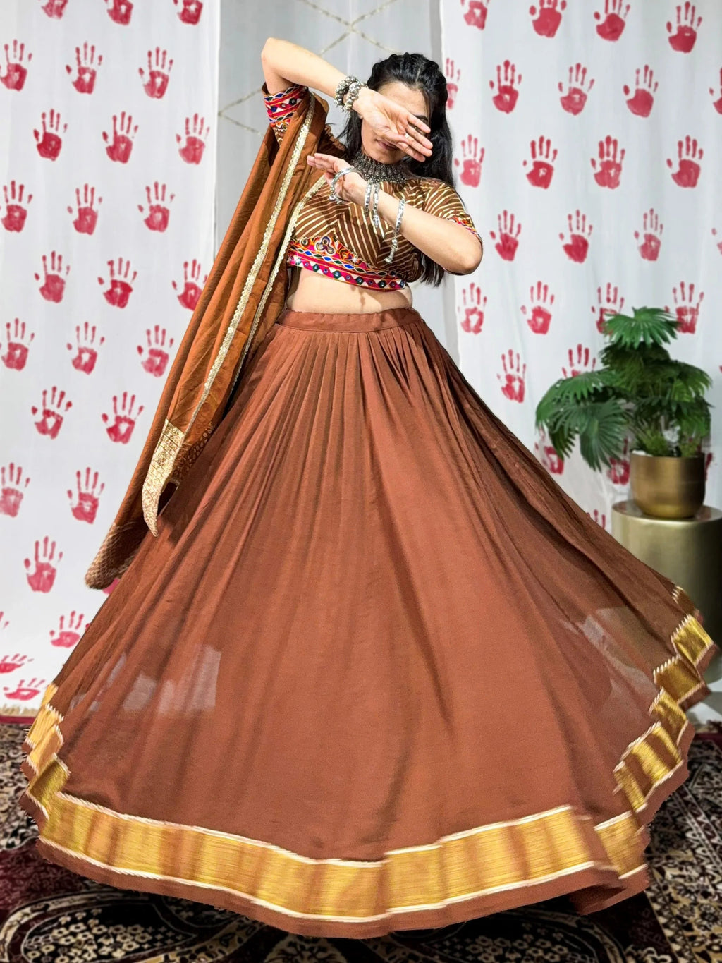 Brown pure chanderi lehenga choli with zari weaving and mirror gamthi work