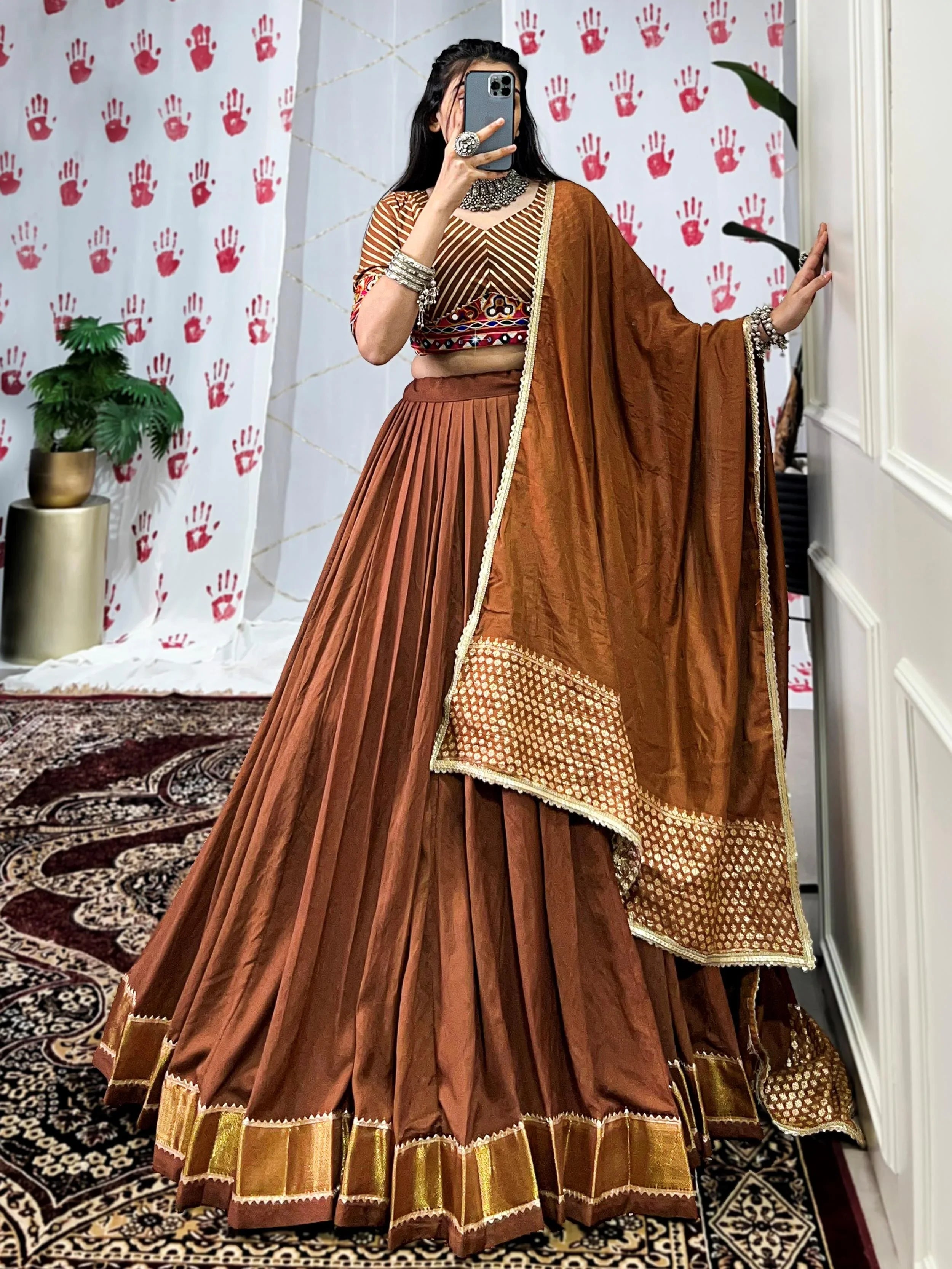 Brown pure chanderi lehenga choli with zari weaving and mirror gamthi work