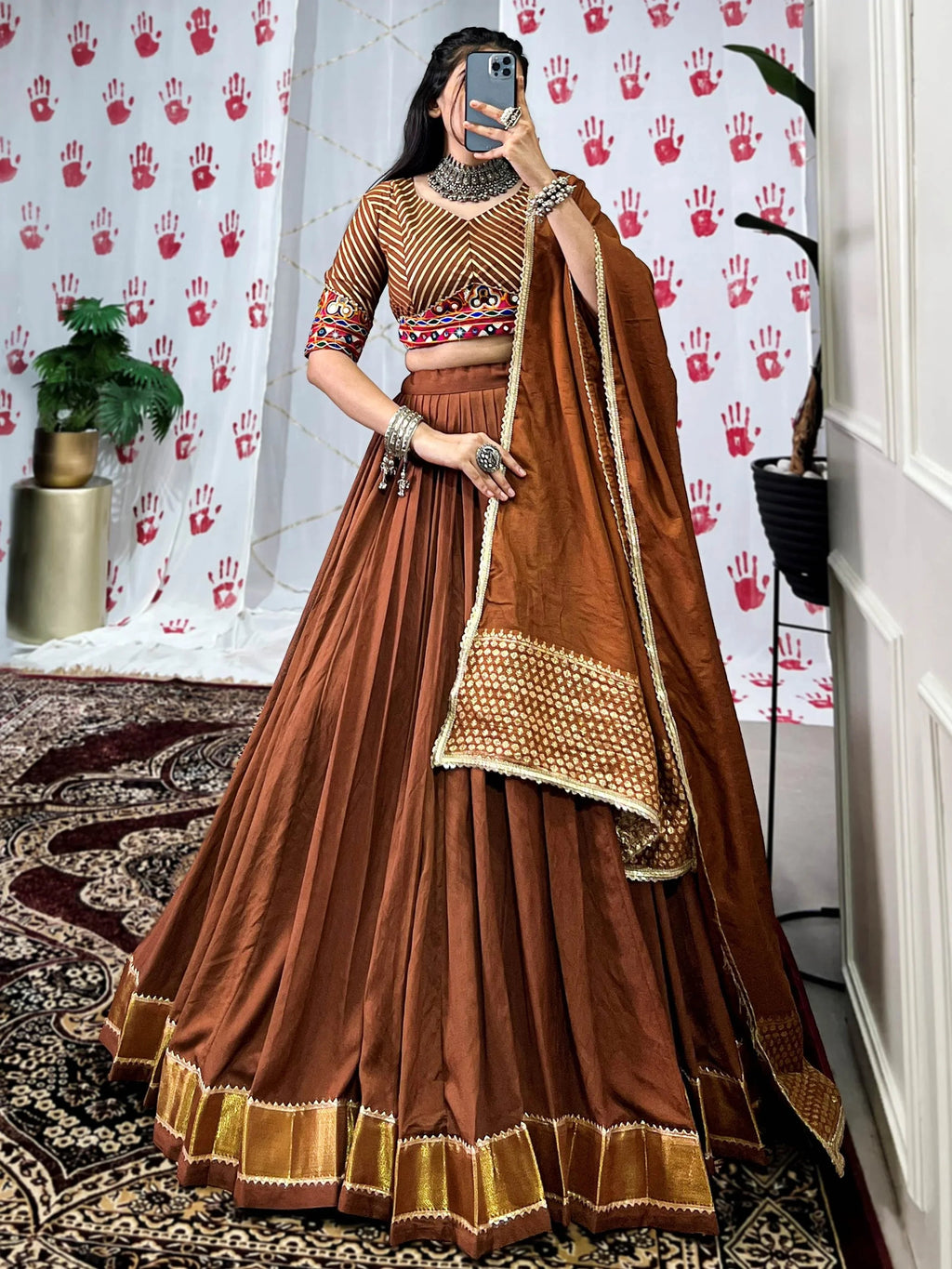 Brown pure chanderi lehenga choli with zari weaving and mirror gamthi work