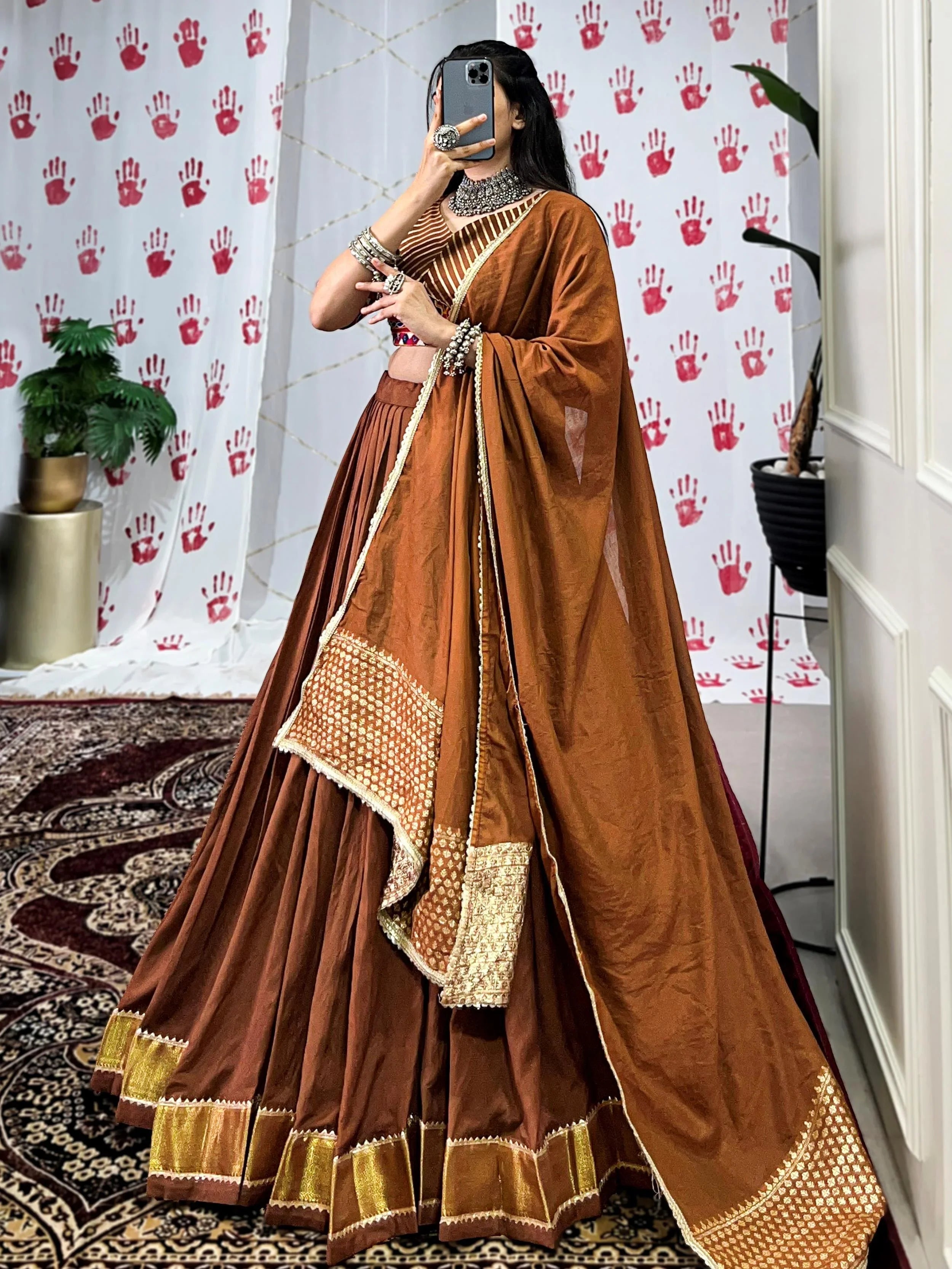 Brown pure chanderi lehenga choli with zari weaving and mirror gamthi work