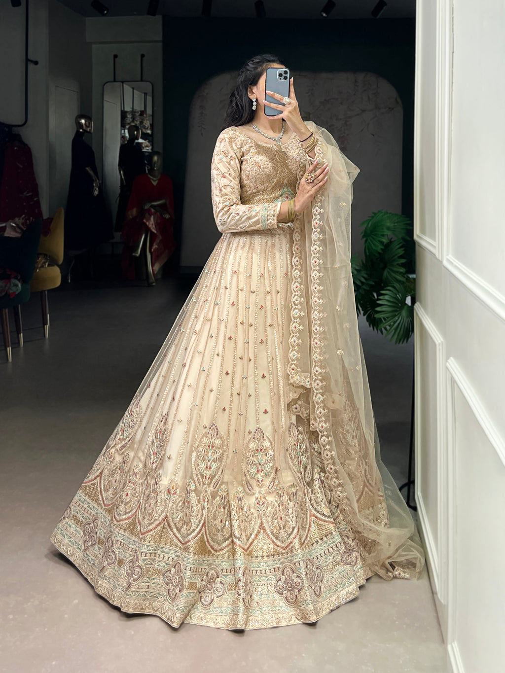 Cream net sequins thread embroidery lehenga choli with dupatta